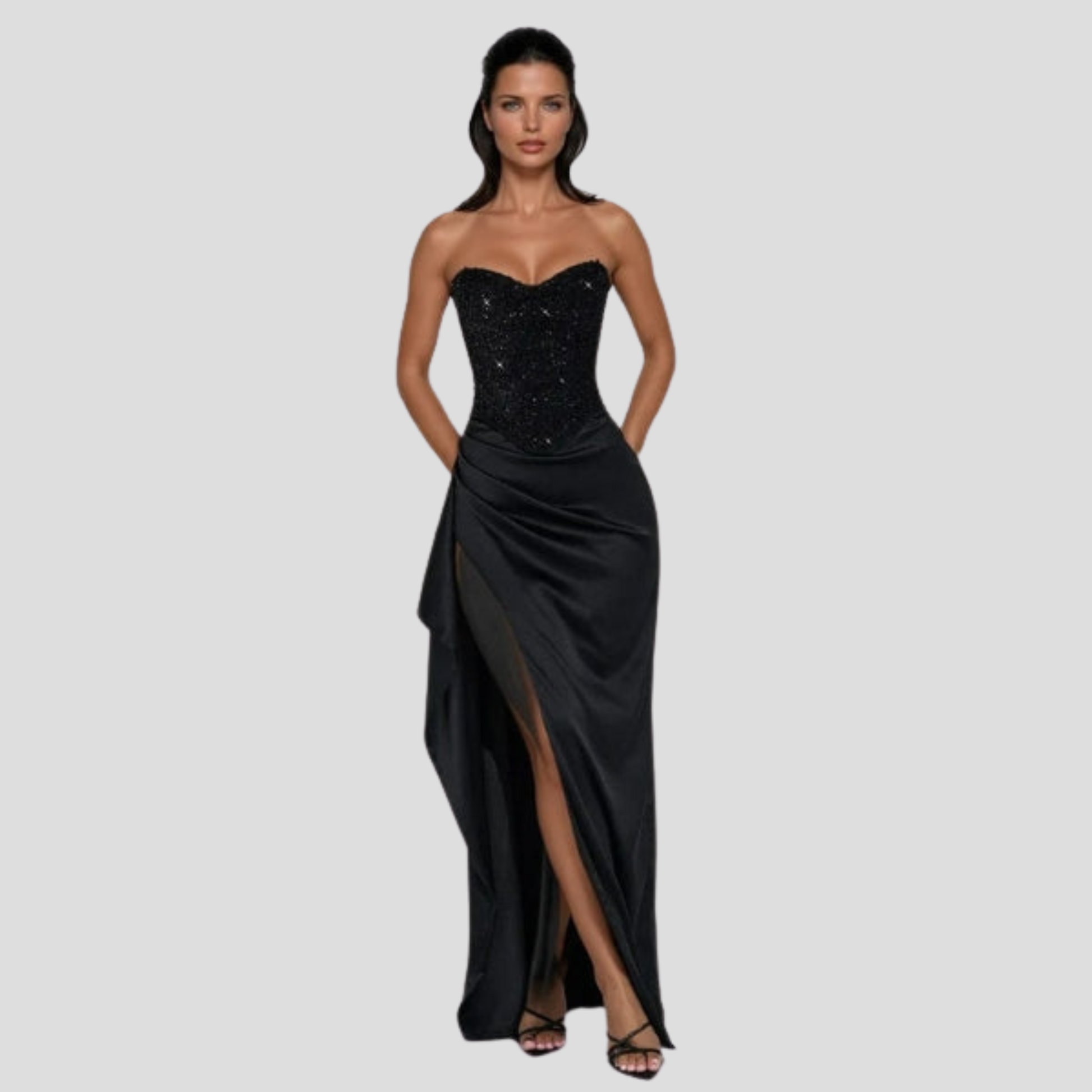 Strapless maxi evening gown with beaded bodice and high-slit skirt in black and white