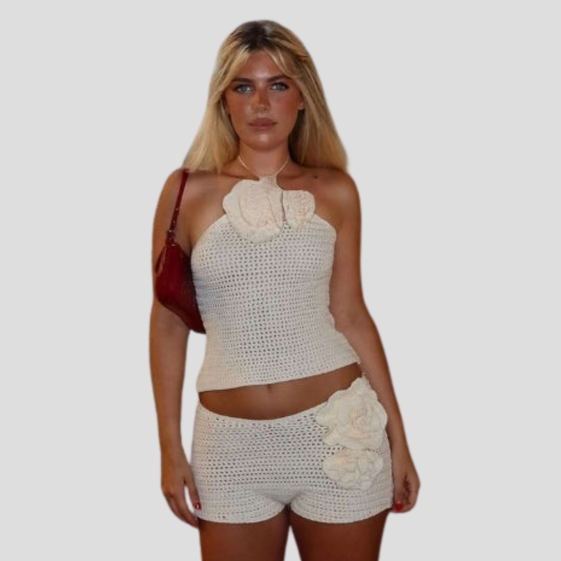 Women's white two-piece short set with halter top and high-rise shorts
