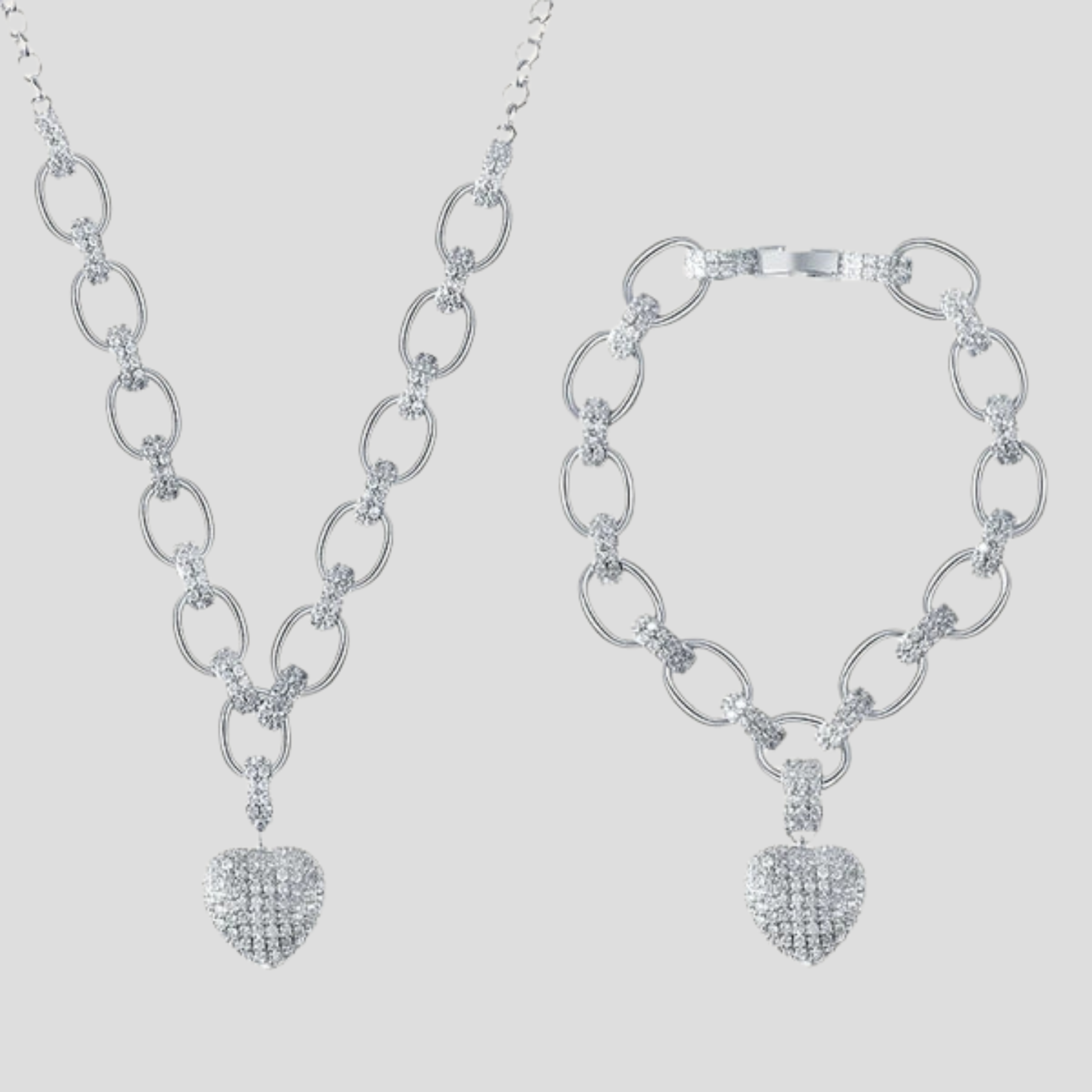 Women's jewelry set with oval chain and pavé heart pendant in gold and silver
