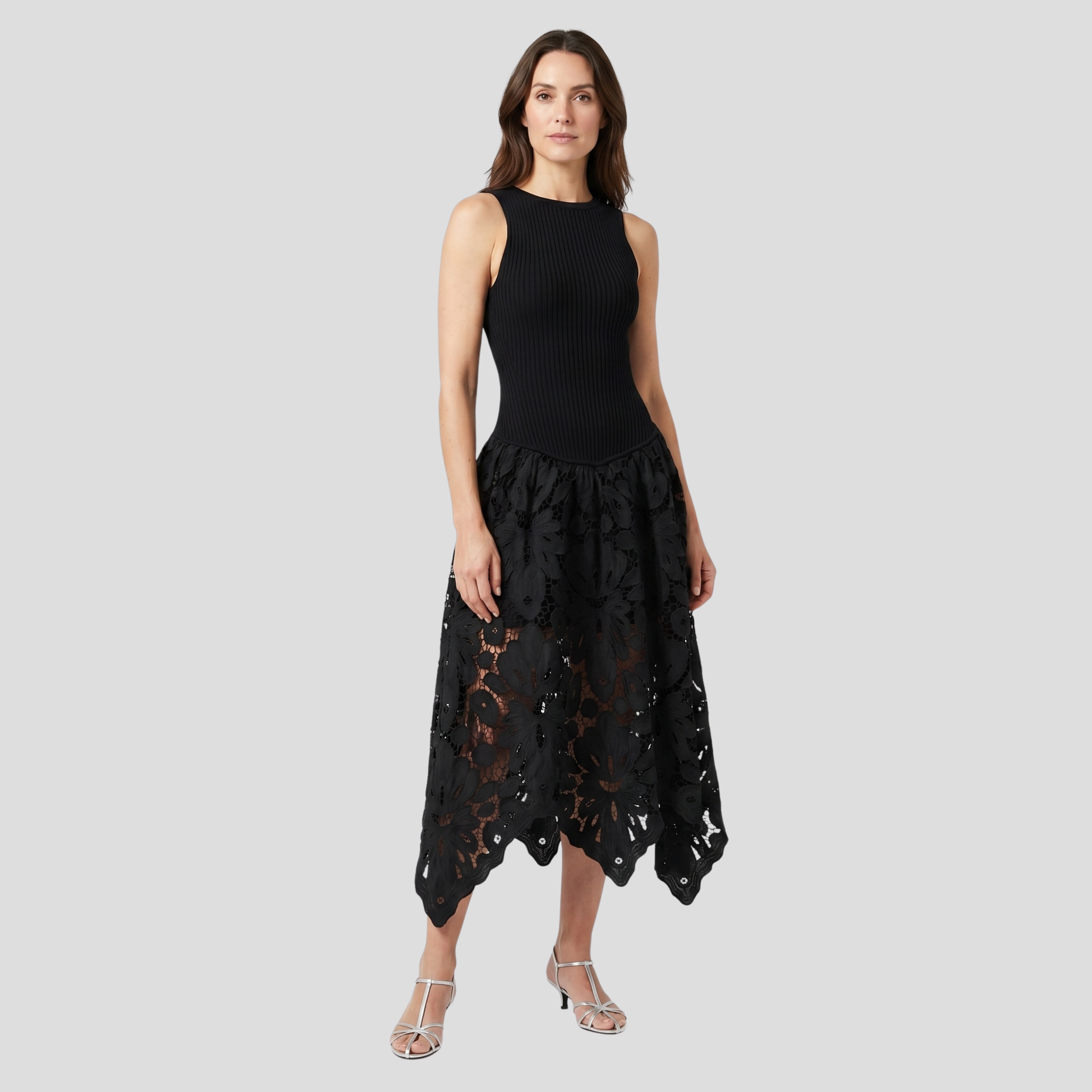 Black open-back midi dress with floral pattern skirt and fitted bodice