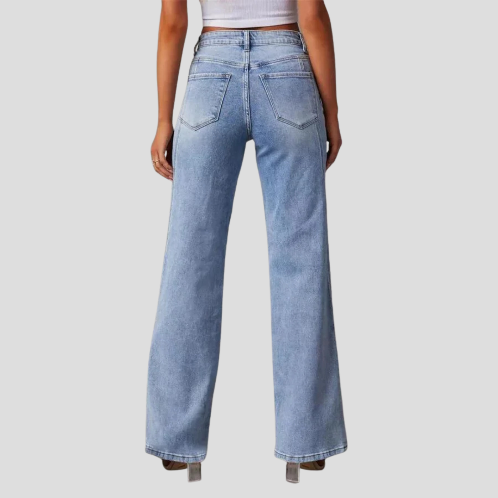 Women's high-waist wide-leg blue jeans styled for casual everyday wear