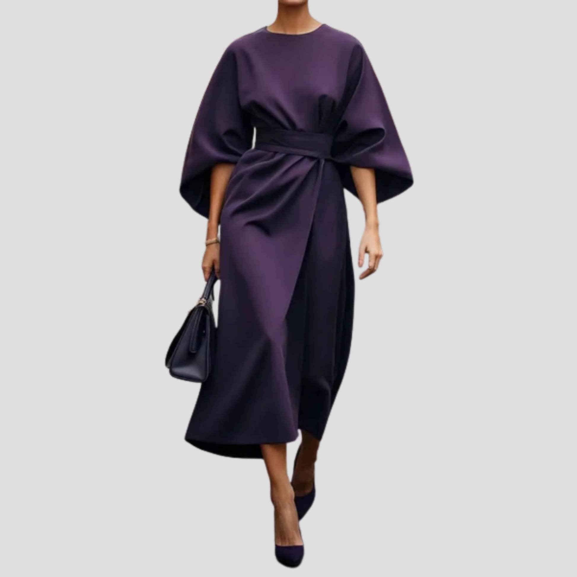 Women's belted floor-length maxi dress with a flowing skirt and defined waist