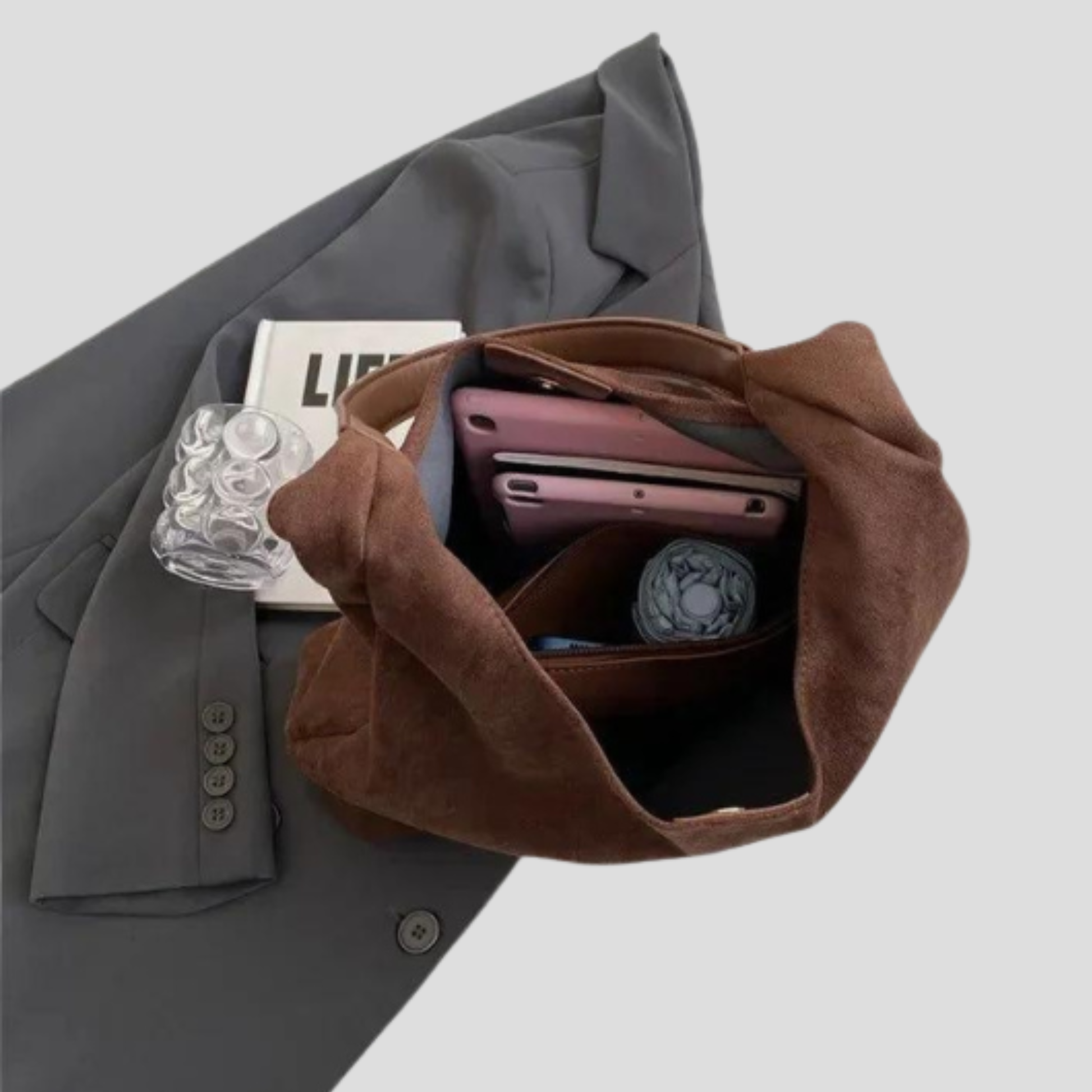 Softly shaped women's shoulder bag with rounded design and clean minimal silhouette