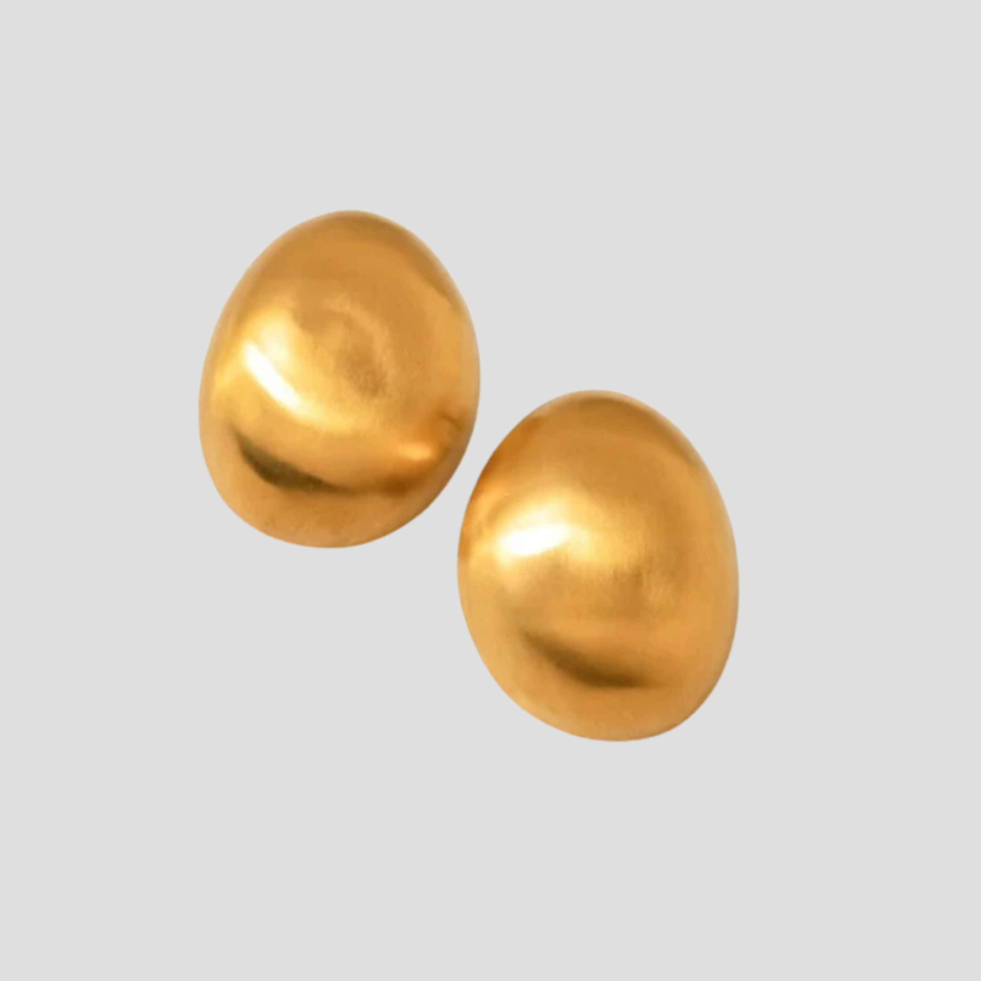 Dome silhouette stud earrings with a matte gold finish for everyday wear