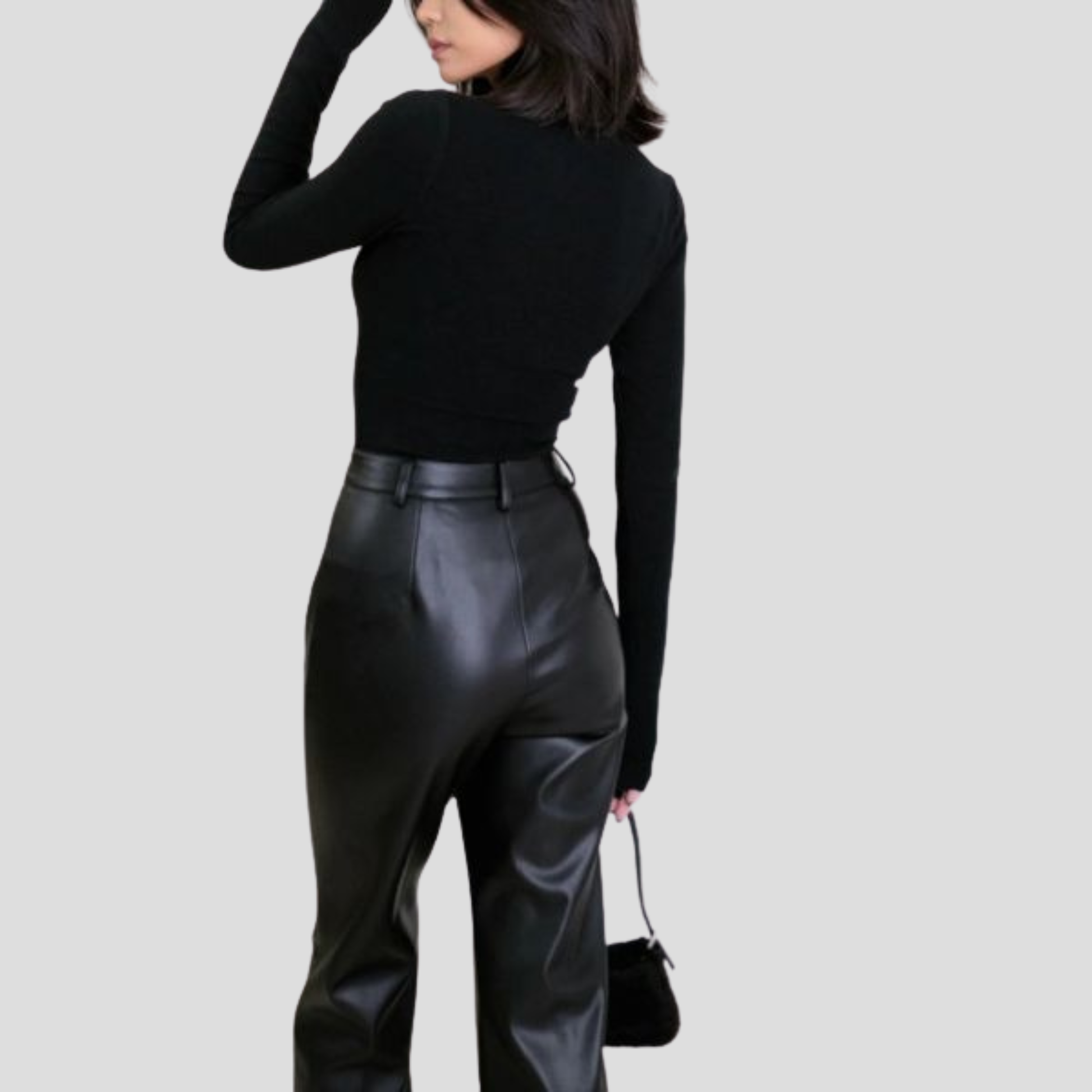 Women's black high-waist straight-leg trousers with a contoured, tailored waist