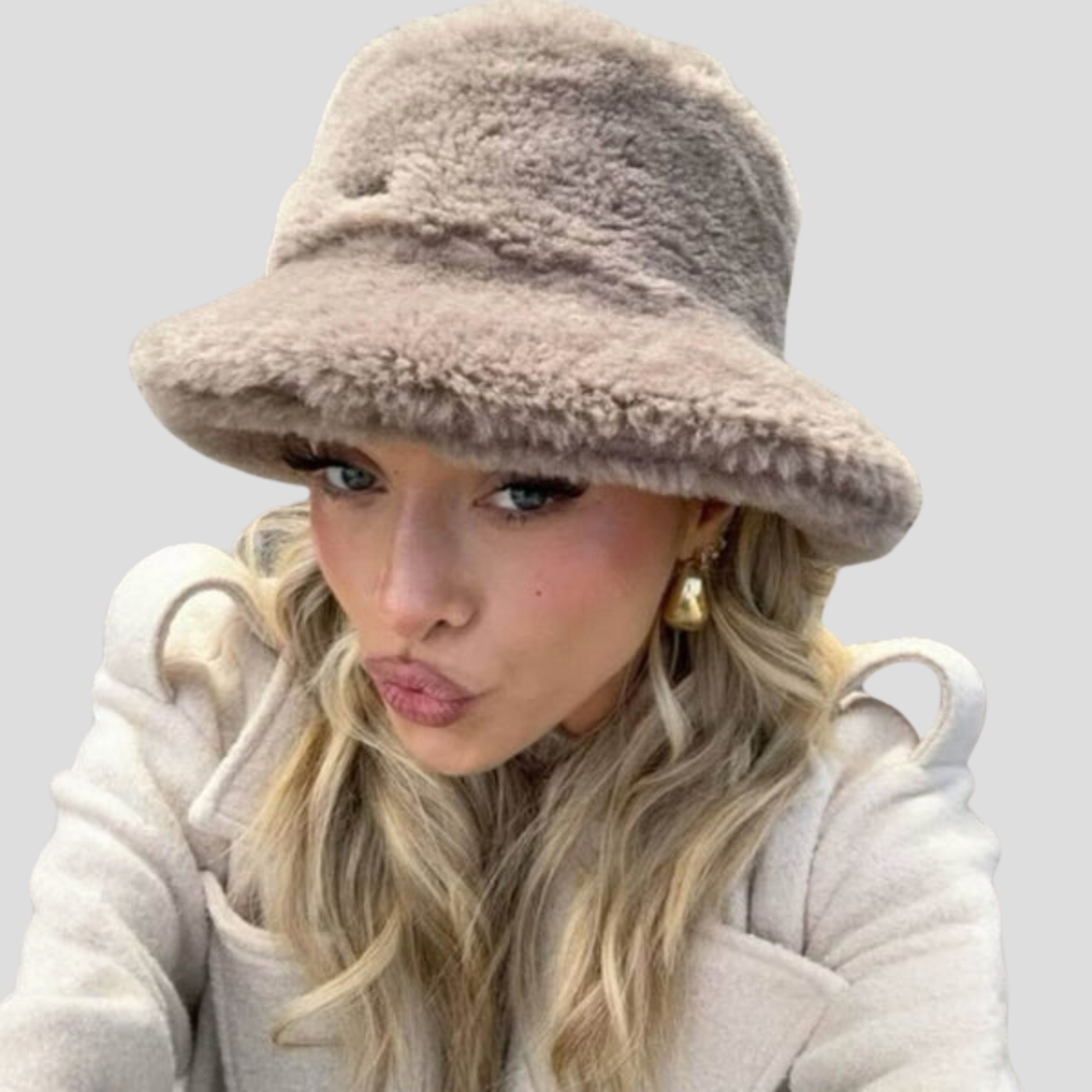 Women's bucket hat with rounded crown and contoured brim, shown in neutral colorways
