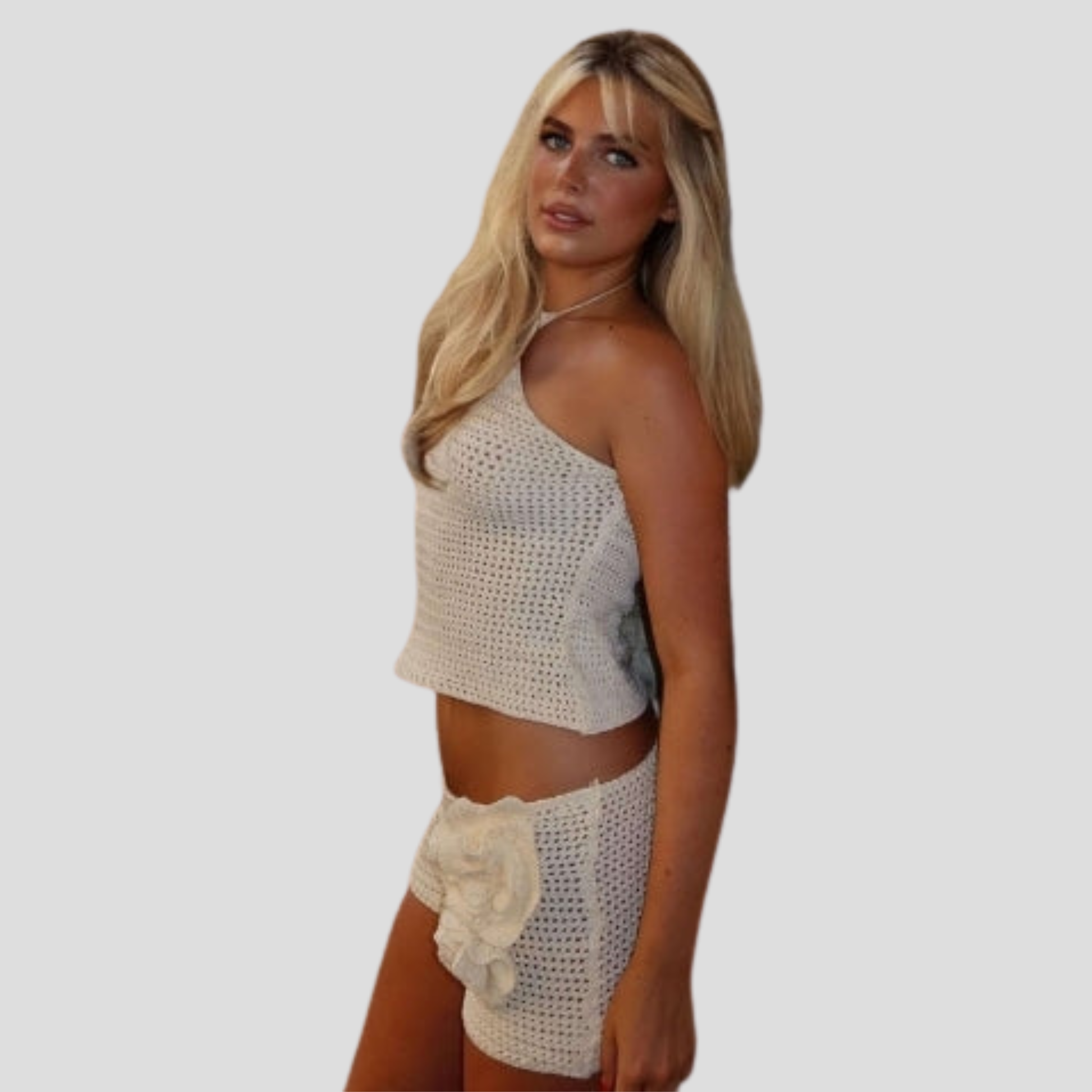 Women's white two-piece short set with halter top and high-rise shorts