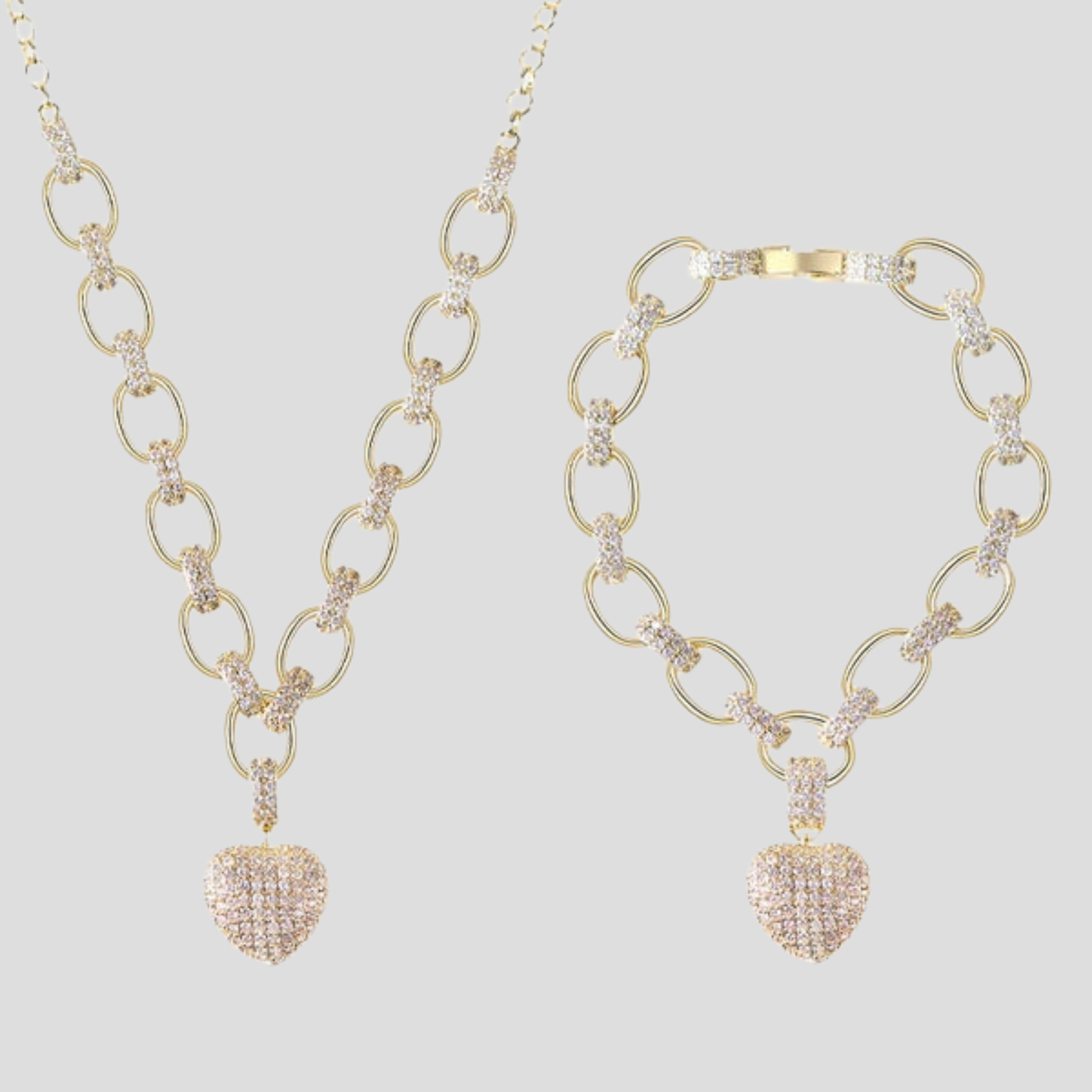 Women's jewelry set with oval chain and pavé heart pendant in gold and silver
