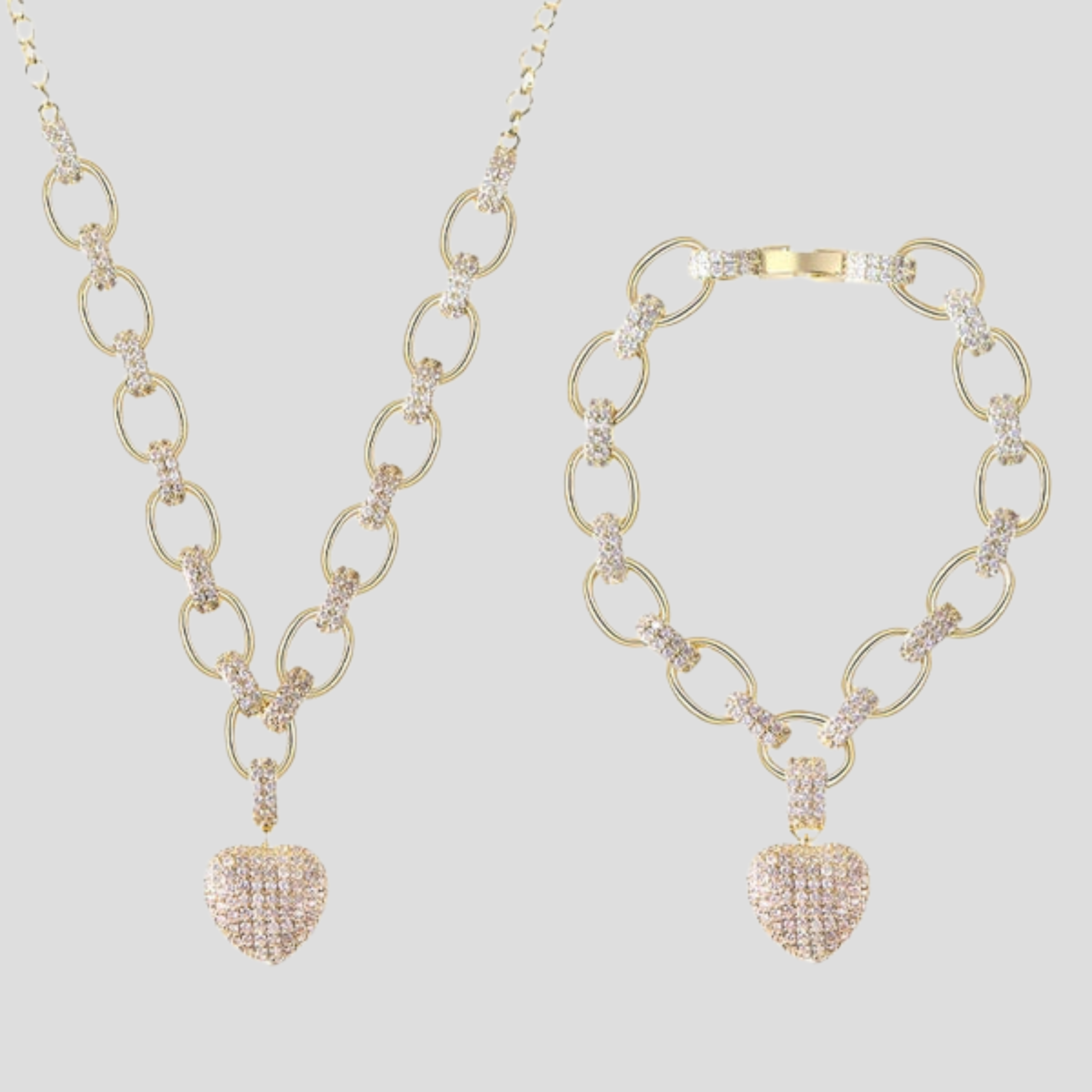 Women's jewelry set with oval chain and pavé heart pendant in gold and silver