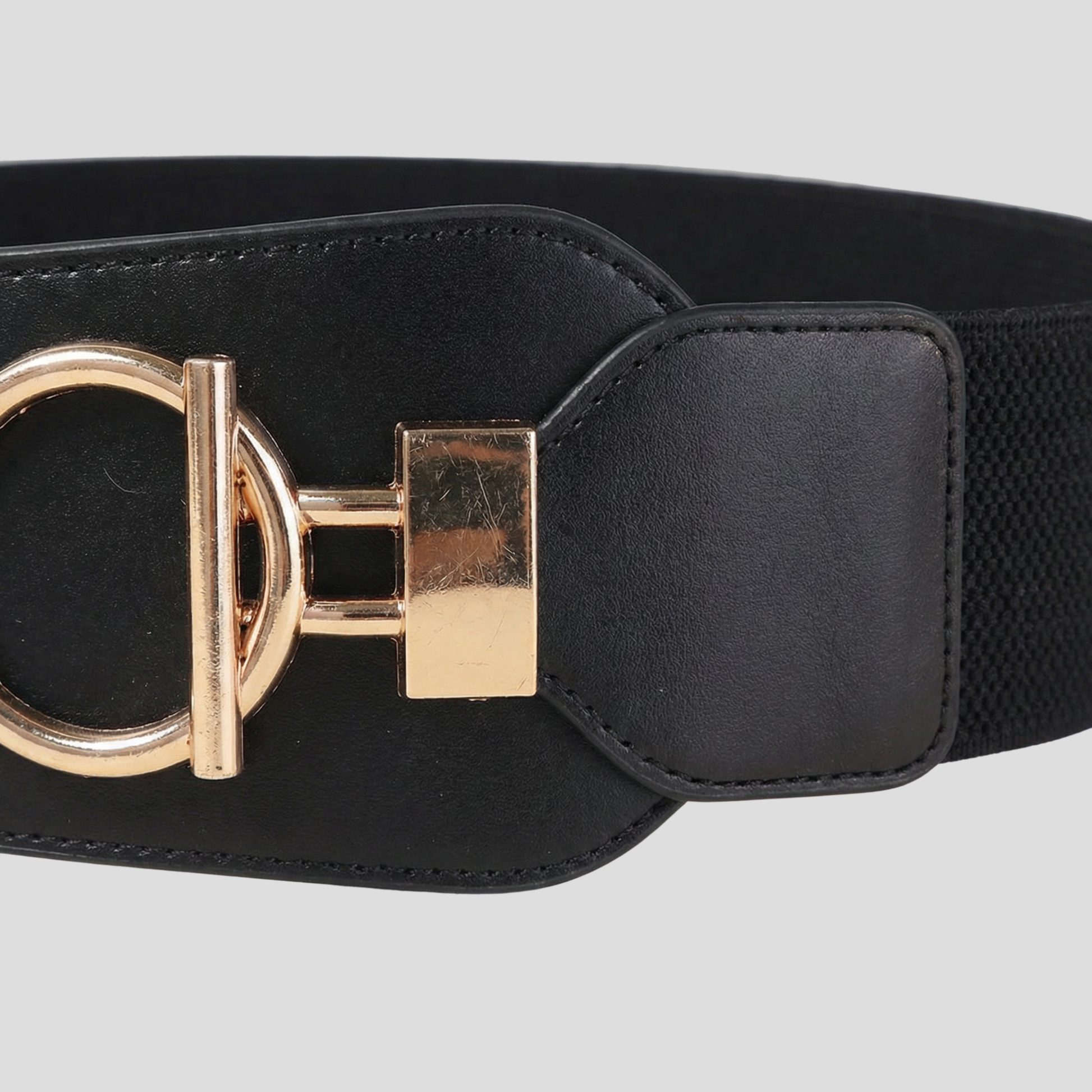 Black women's waist belt with wide front panel and circular buckle