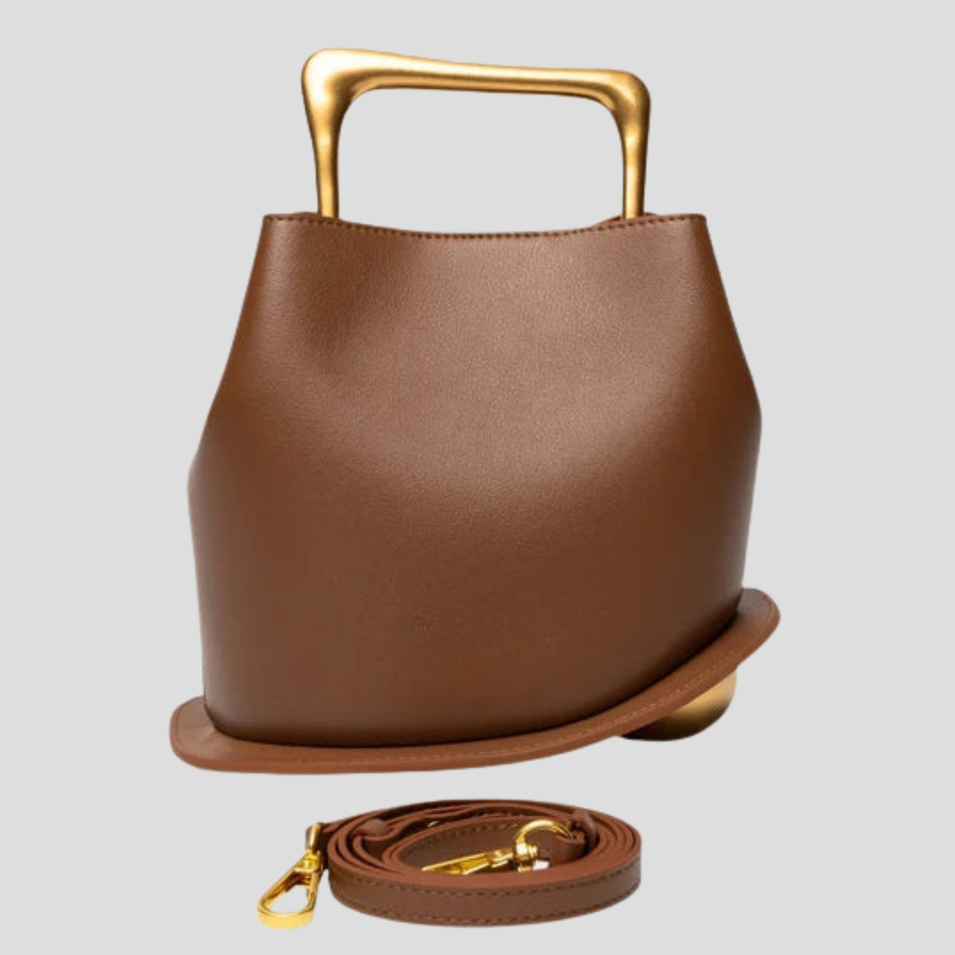 Rounded mini handbag with sculpted handle shown in neutral colorways