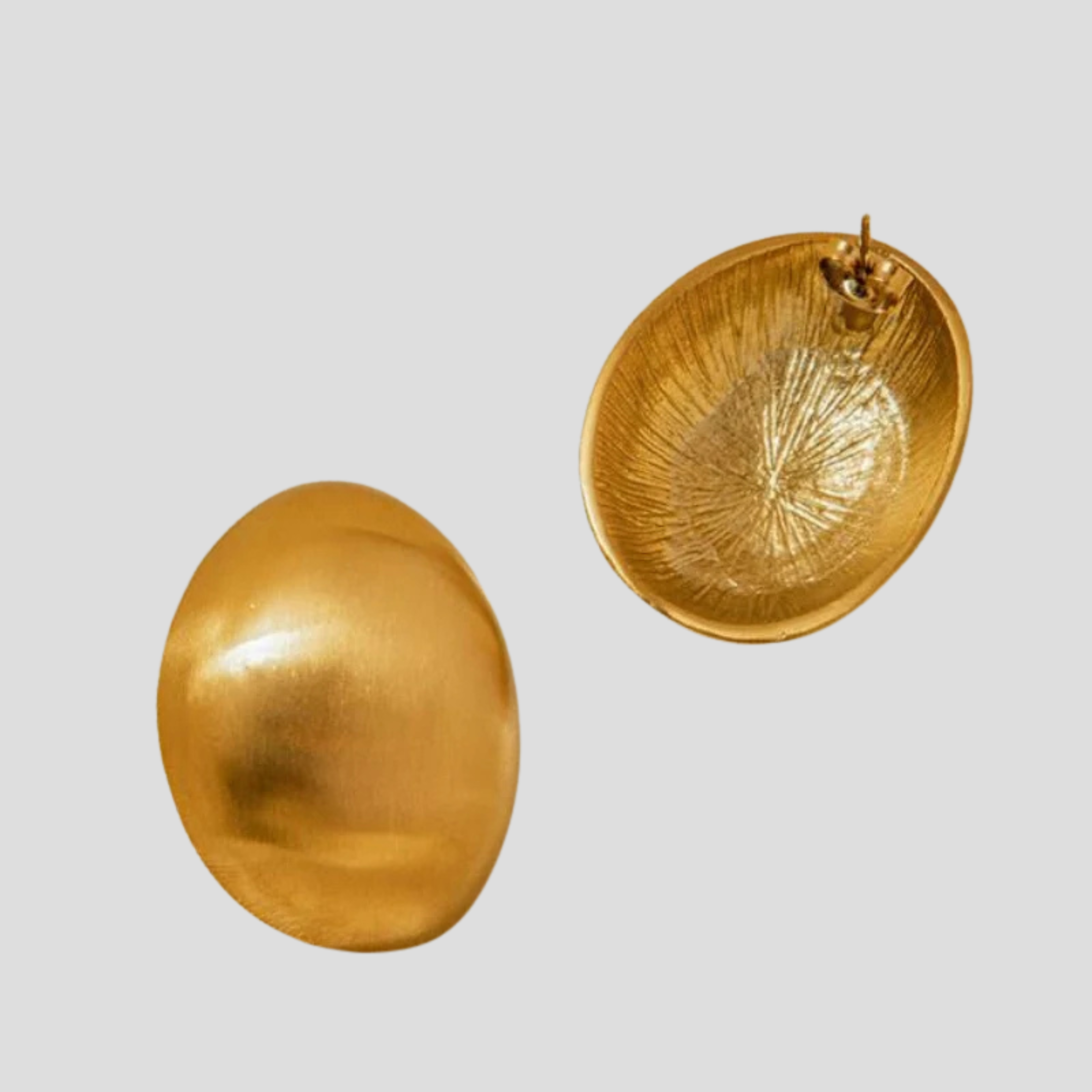 Dome silhouette stud earrings with a matte gold finish for everyday wear