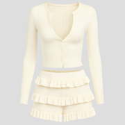 White women's two-piece set with textured top and coordinated skirt