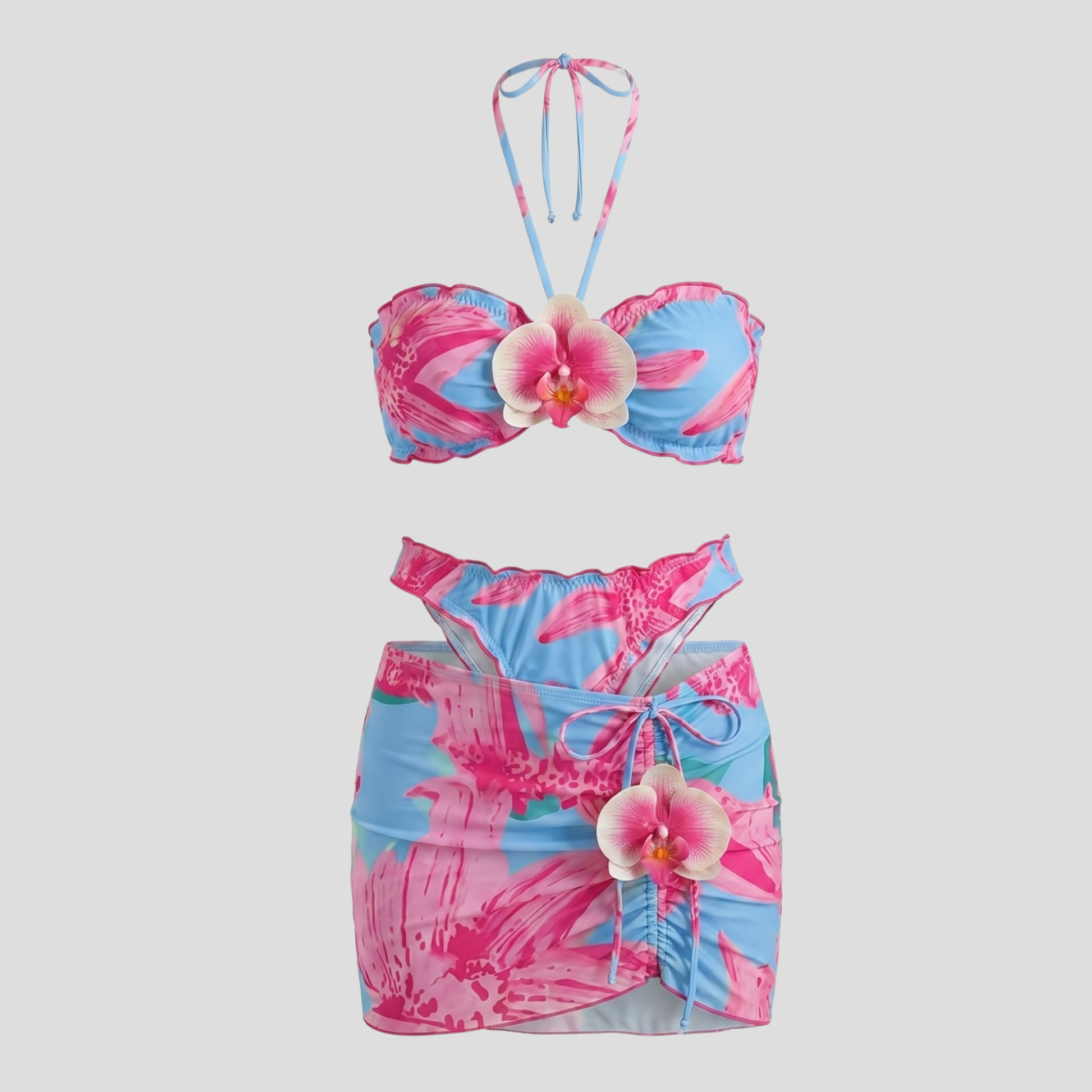 Women's three-piece floral resort set with halter top and wrap-style mini skirt