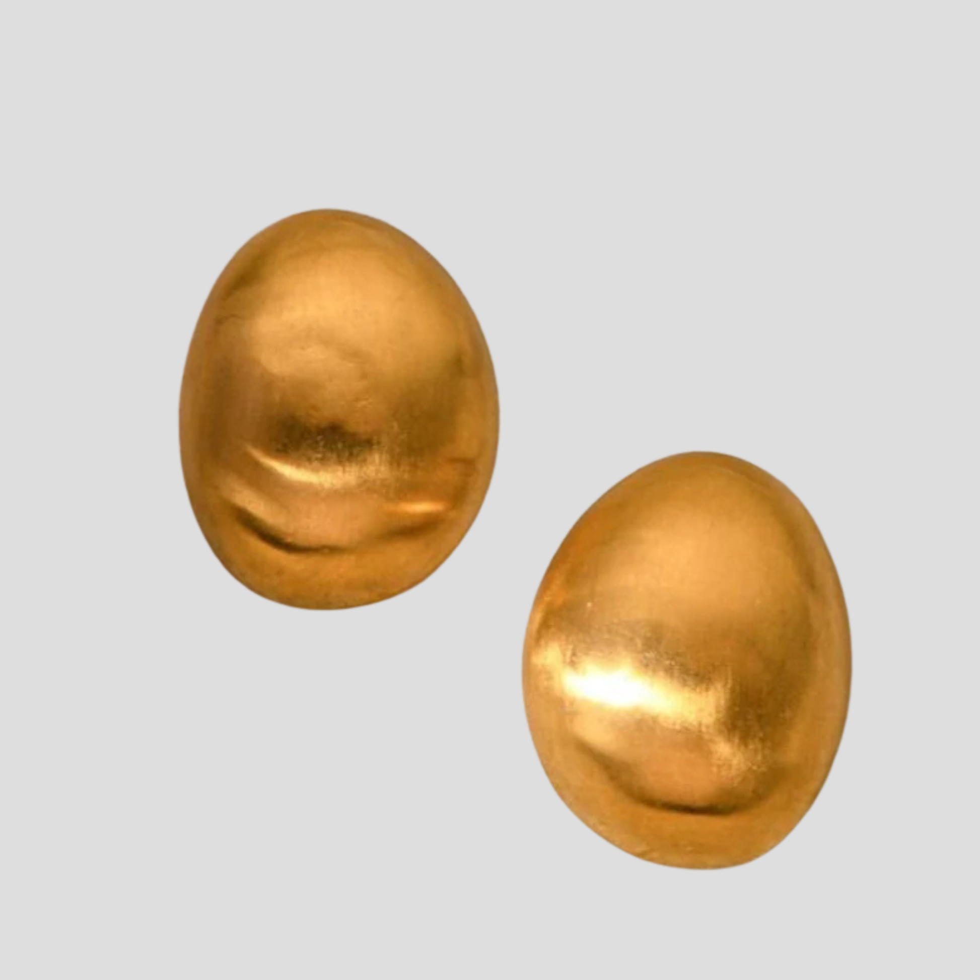 Dome silhouette stud earrings with a matte gold finish for everyday wear