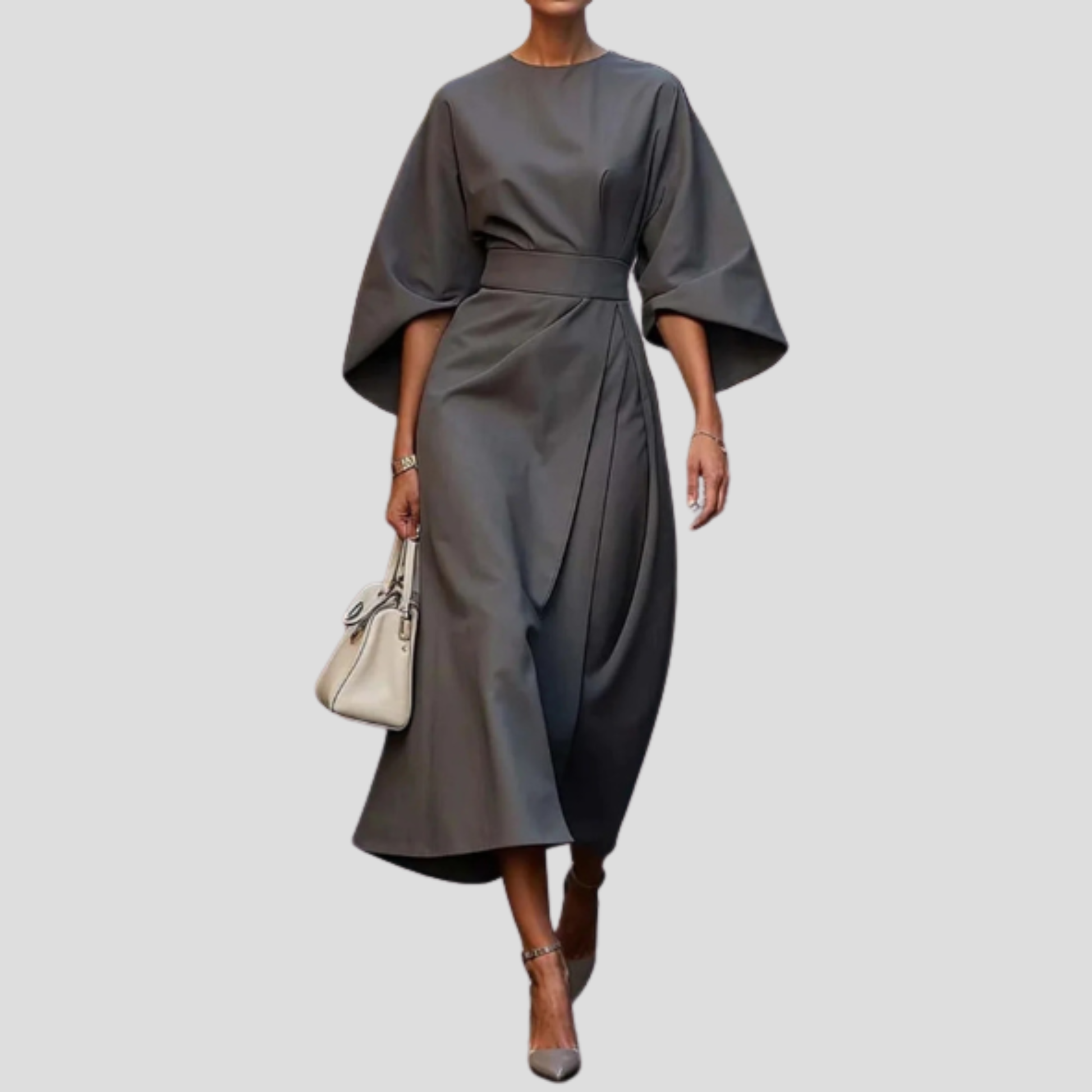 Women's belted floor-length maxi dress with a flowing skirt and defined waist