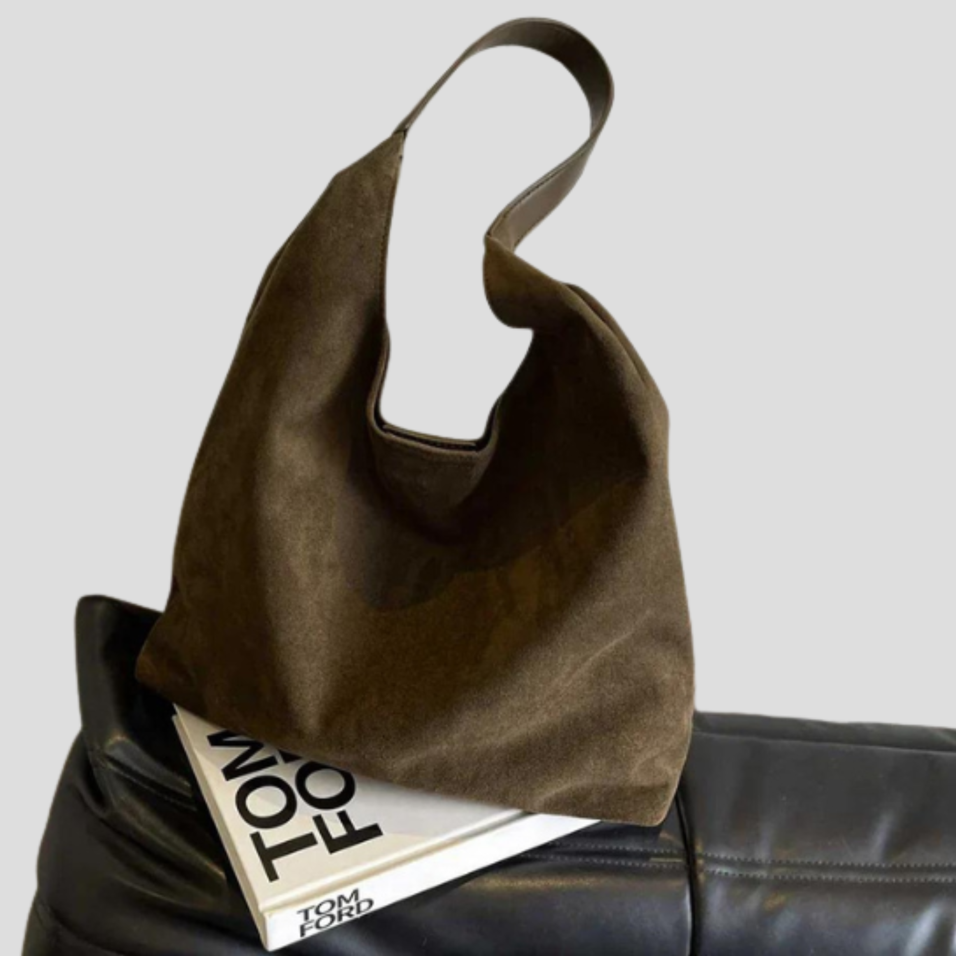 Softly shaped women's shoulder bag with rounded design and clean minimal silhouette