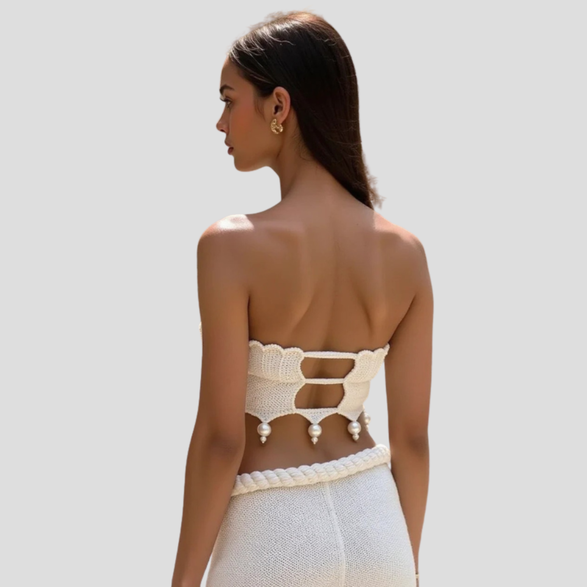 Women's white two-piece set with shell-inspired bodice and full-length skirt for occasions