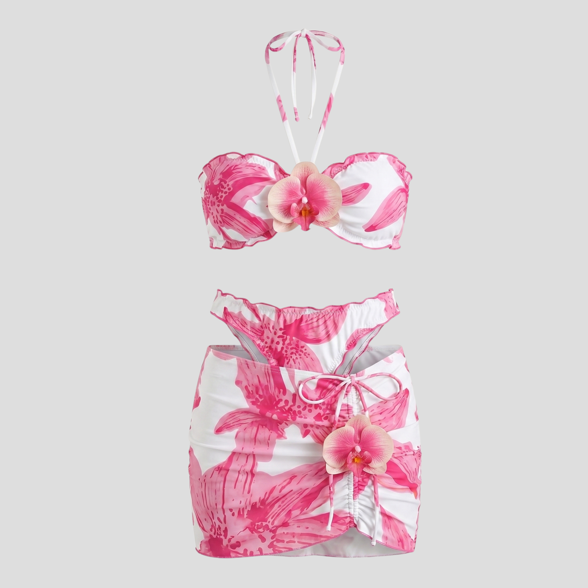 Women's three-piece floral resort set with halter top and wrap-style mini skirt