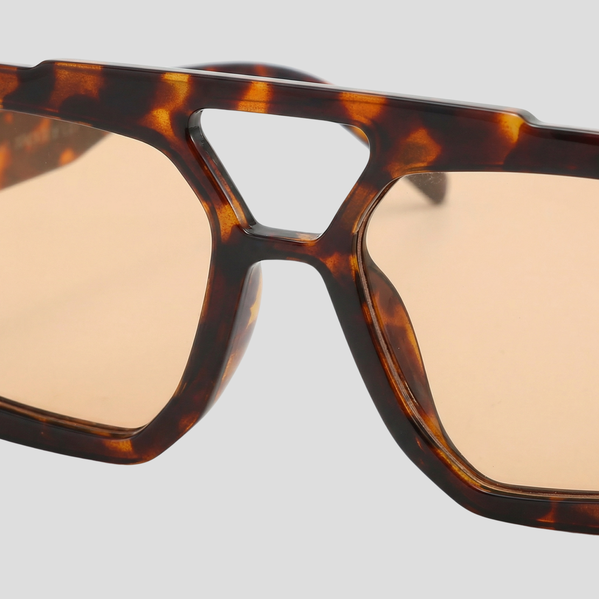Women's brown square-frame sunglasses with a defined geometric outline