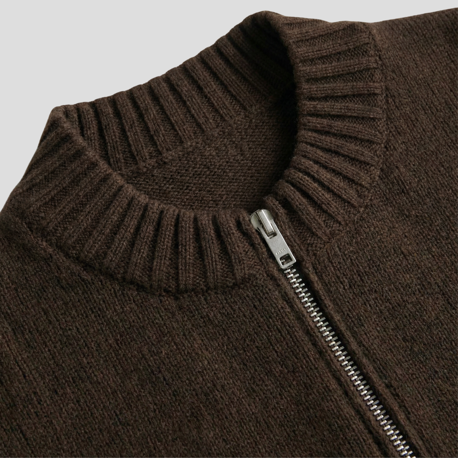 Women's zip-front relaxed cardigan shown in brown, beige and grey