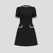 Structured mock neck mini dress with pearl-trim detailing in black and white