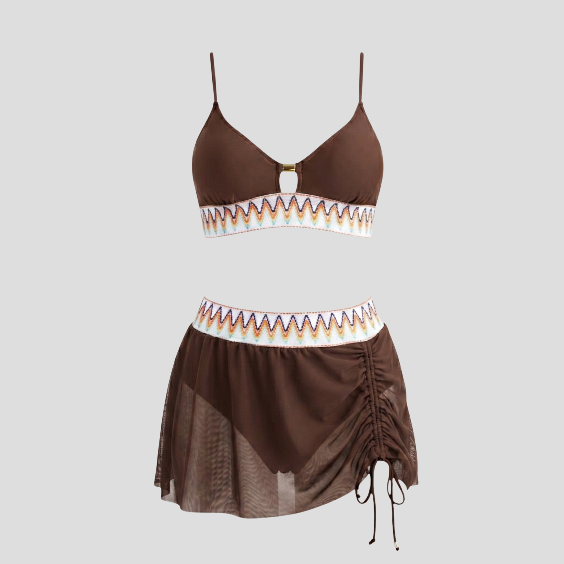 Women's three-piece swimwear set with embroidered waistband, metallic detail, and sheer tulle skirt