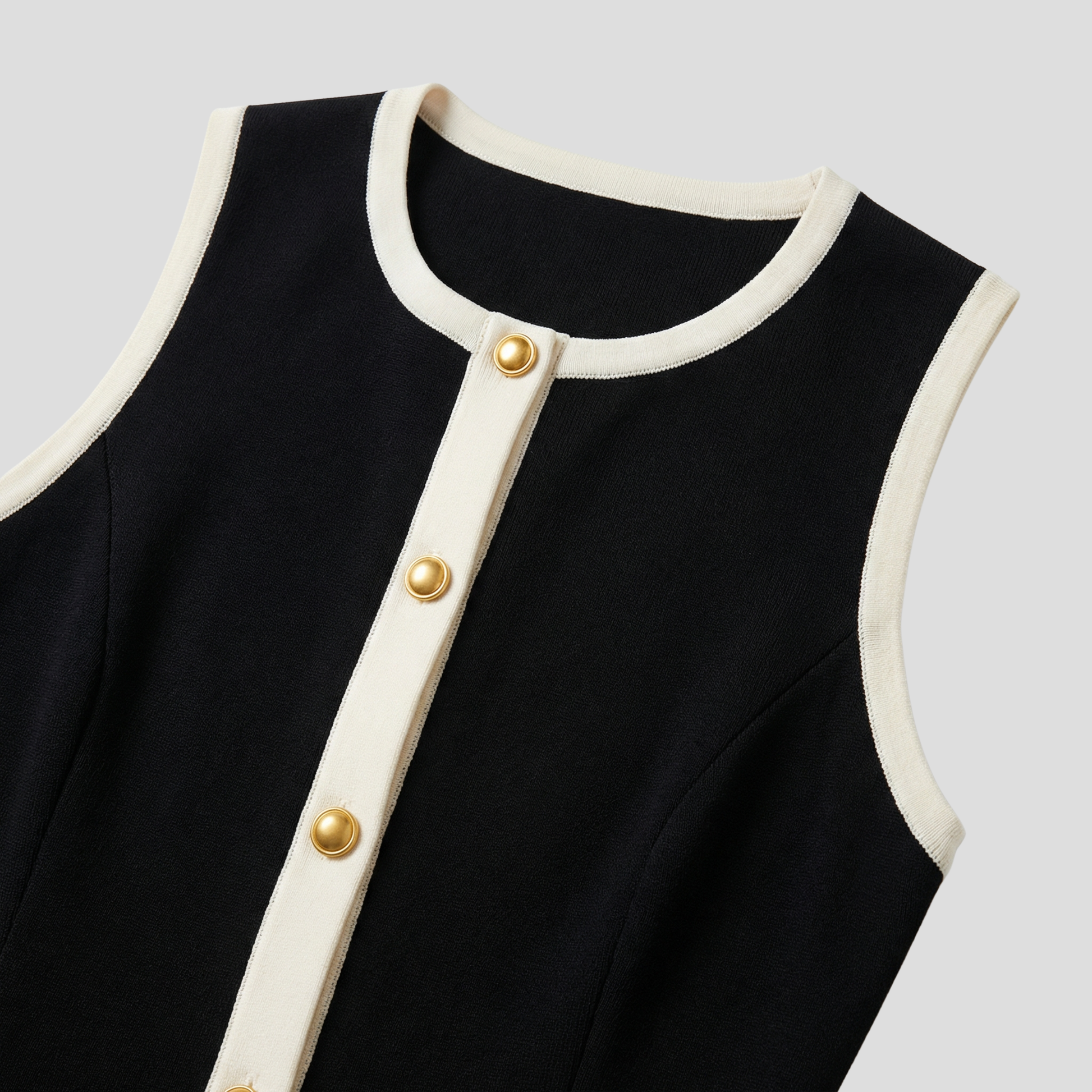Black sleeveless midi dress with contrast trim detail for evening wear