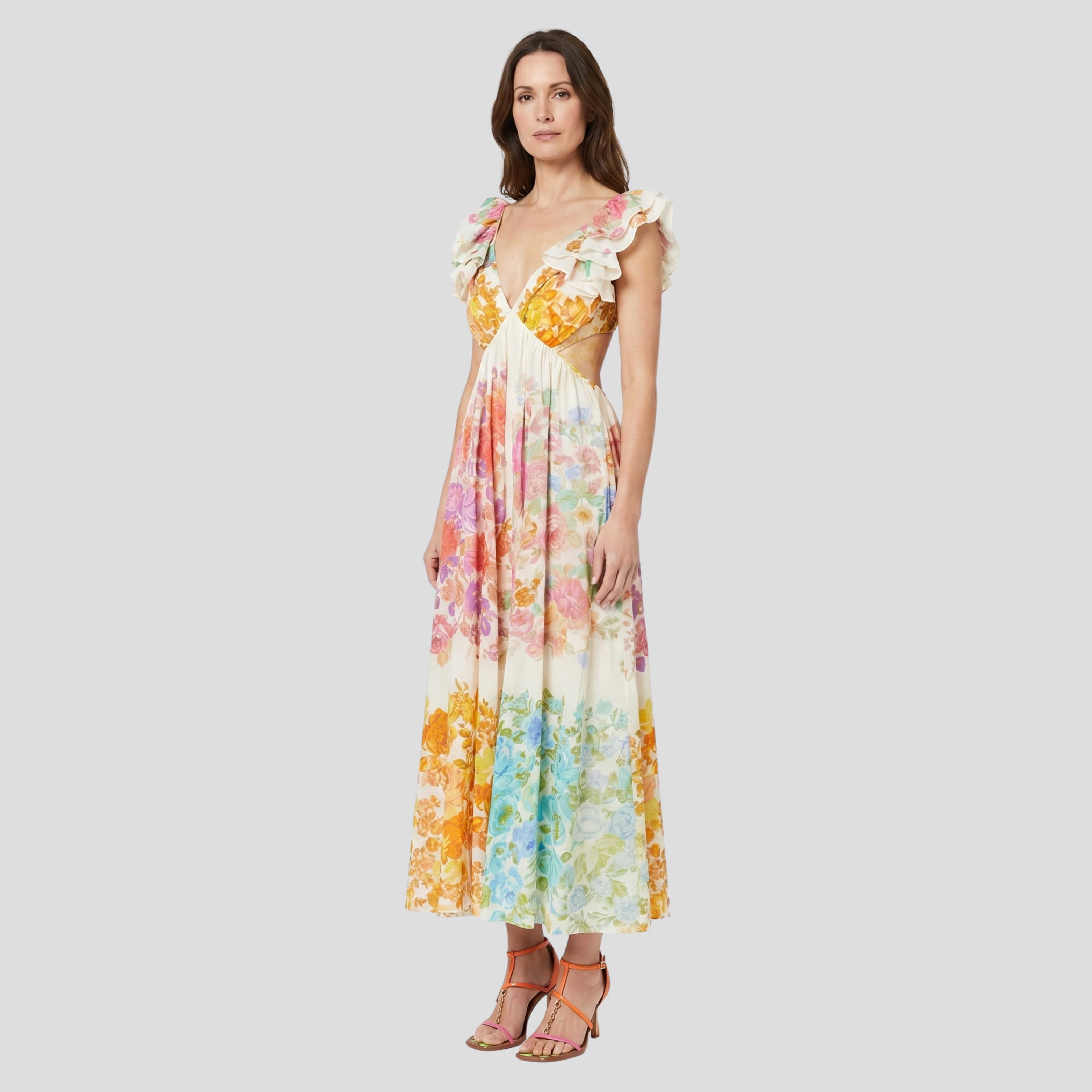 Yellow floral print flowing maxi dress with a flattering waist and elongated silhouette