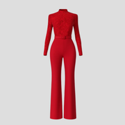 Red women's high-neck jumpsuit with belted waist and flared silhouette