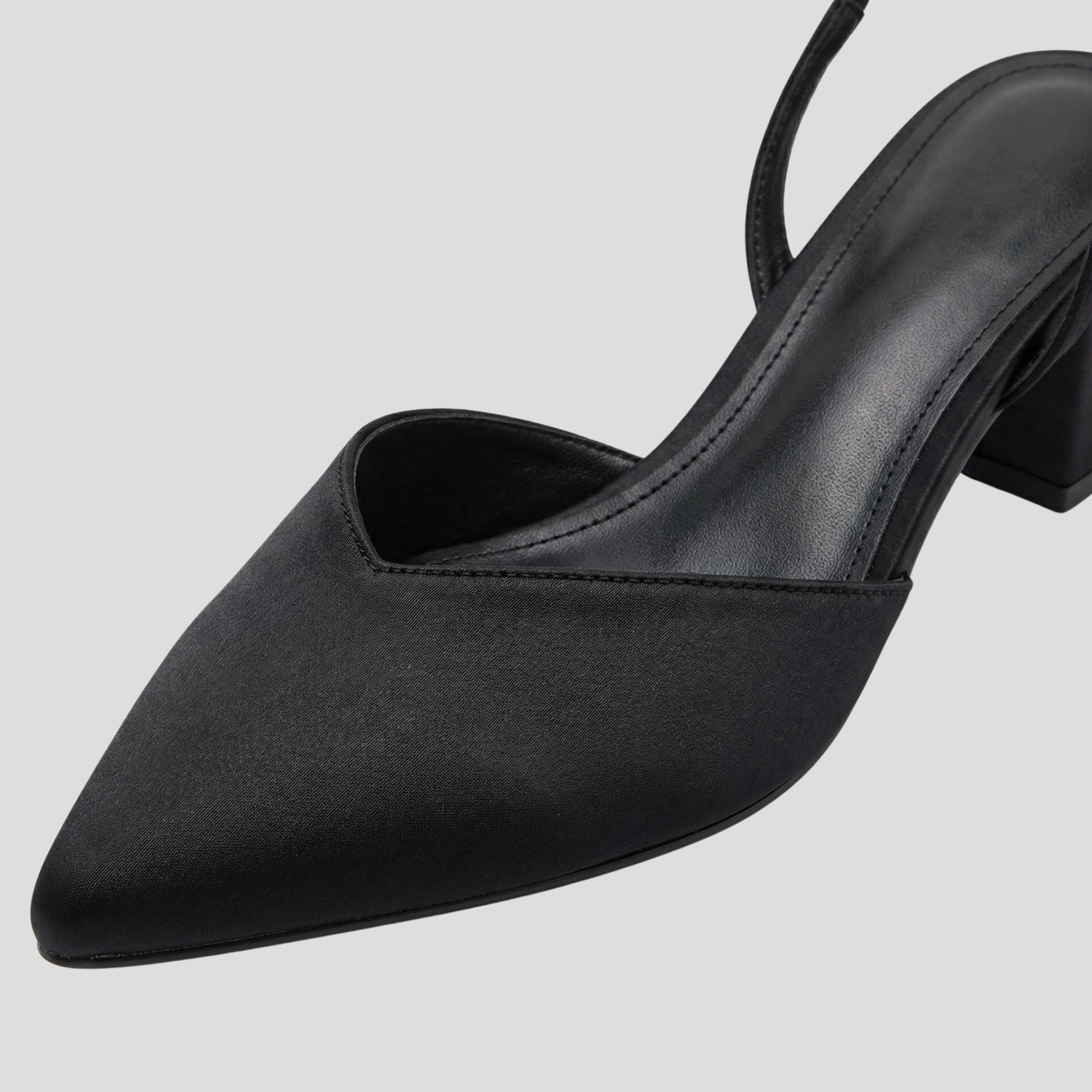 Women's slingback block heel with pointed toe in white, black, and beige