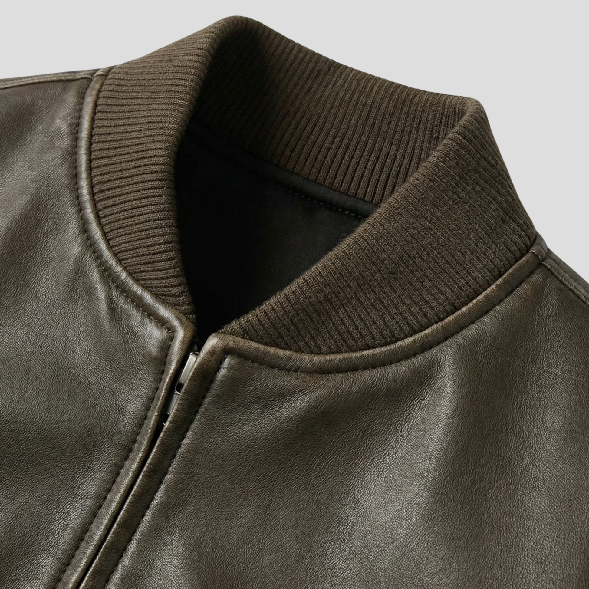 Brown women's jacket with ribbed cuffs and hem and a streamlined silhouette
