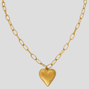 Gold-tone heart pendant necklace with a bold link chain silhouette