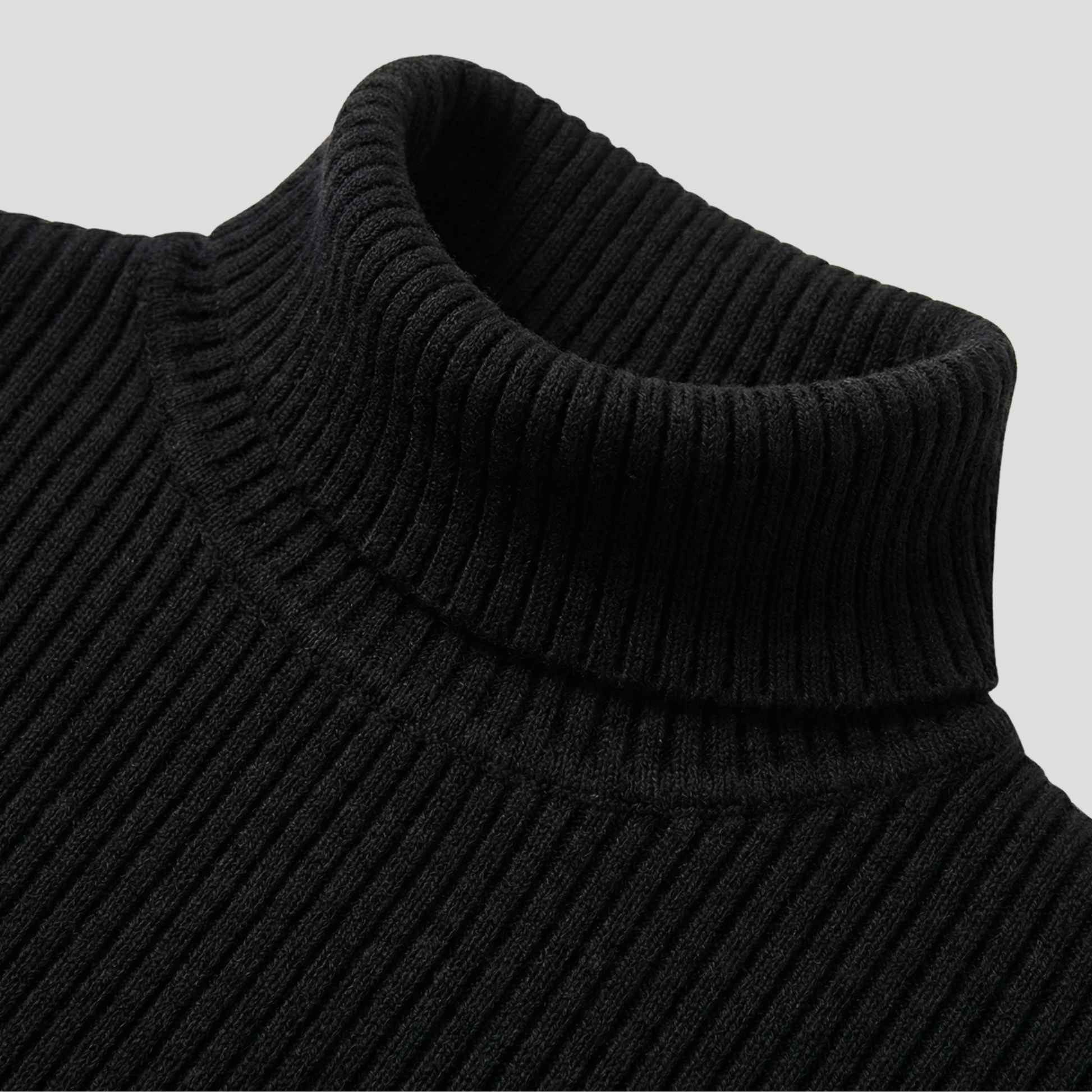 Women's black ribbed high-neck sweater with a slim silhouette