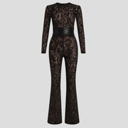 Women's jumpsuit with fitted bodice and flared leg silhouette in black and white