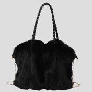 Oversized tote bag with braided handle detail, shown in black, brown, and beige