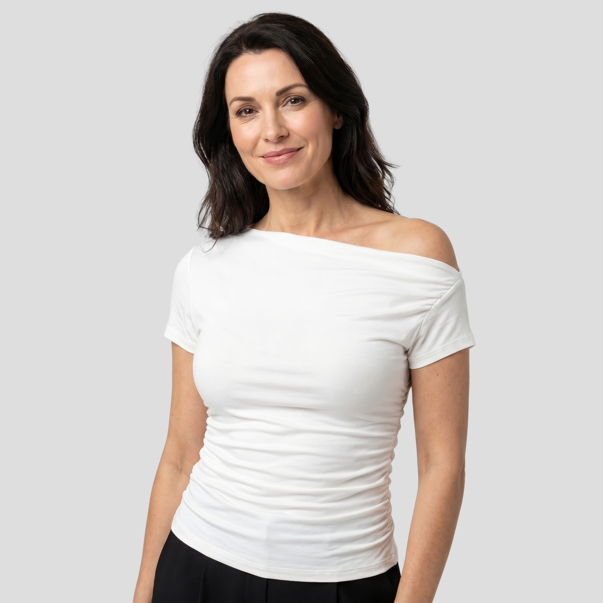 Women's asymmetric one-shoulder ruched top shown in black