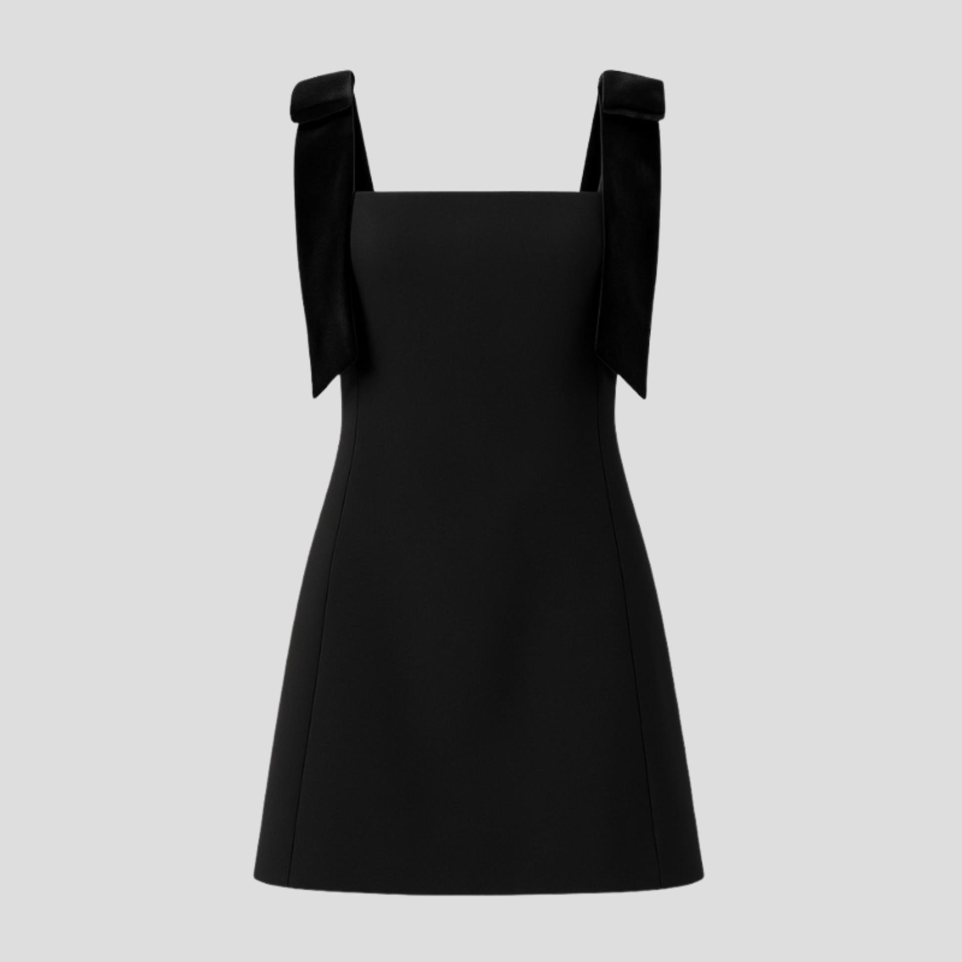Black bow strap mini dress with A-line silhouette for evening wear