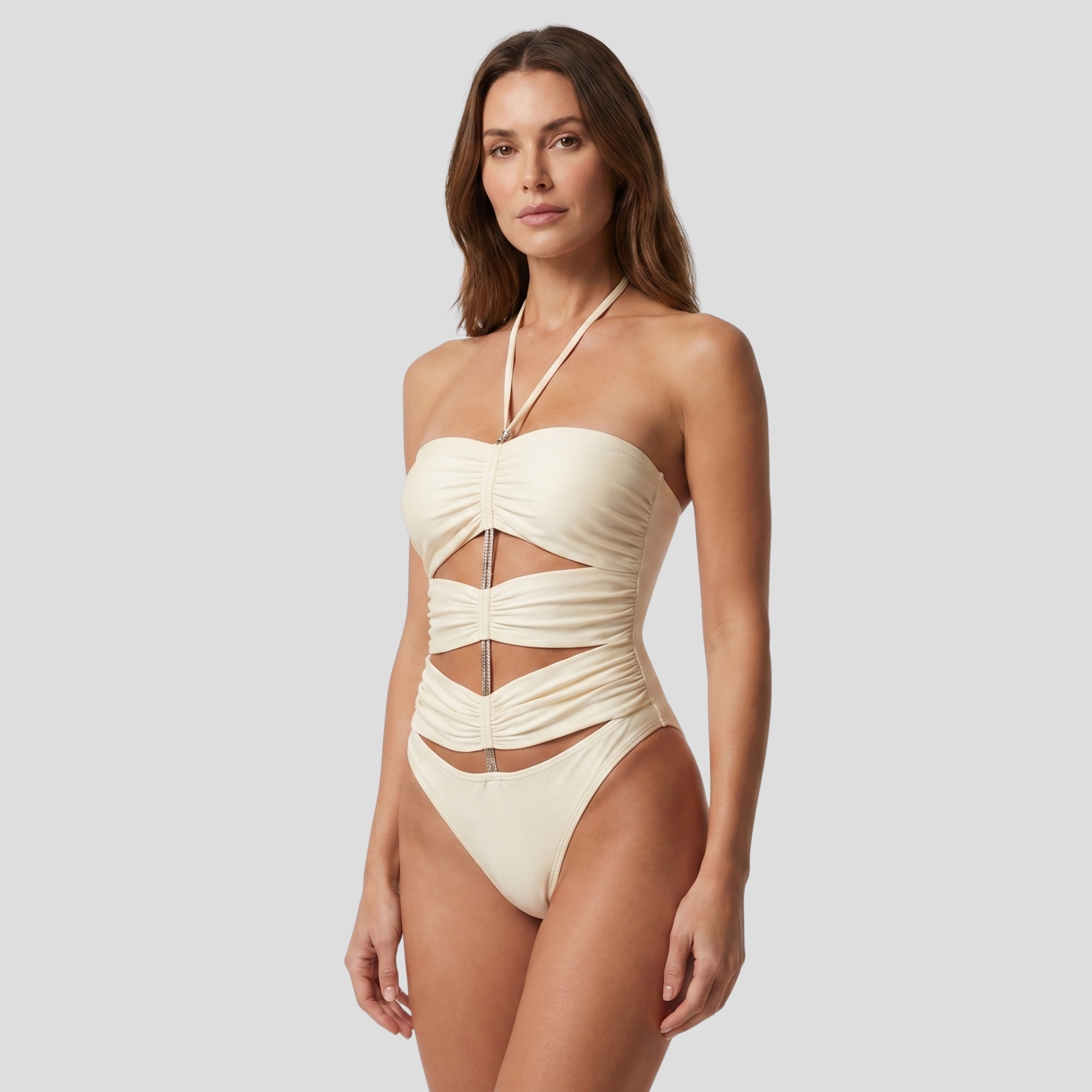 White one-piece swimsuit with cutout detailing and contoured silhouette