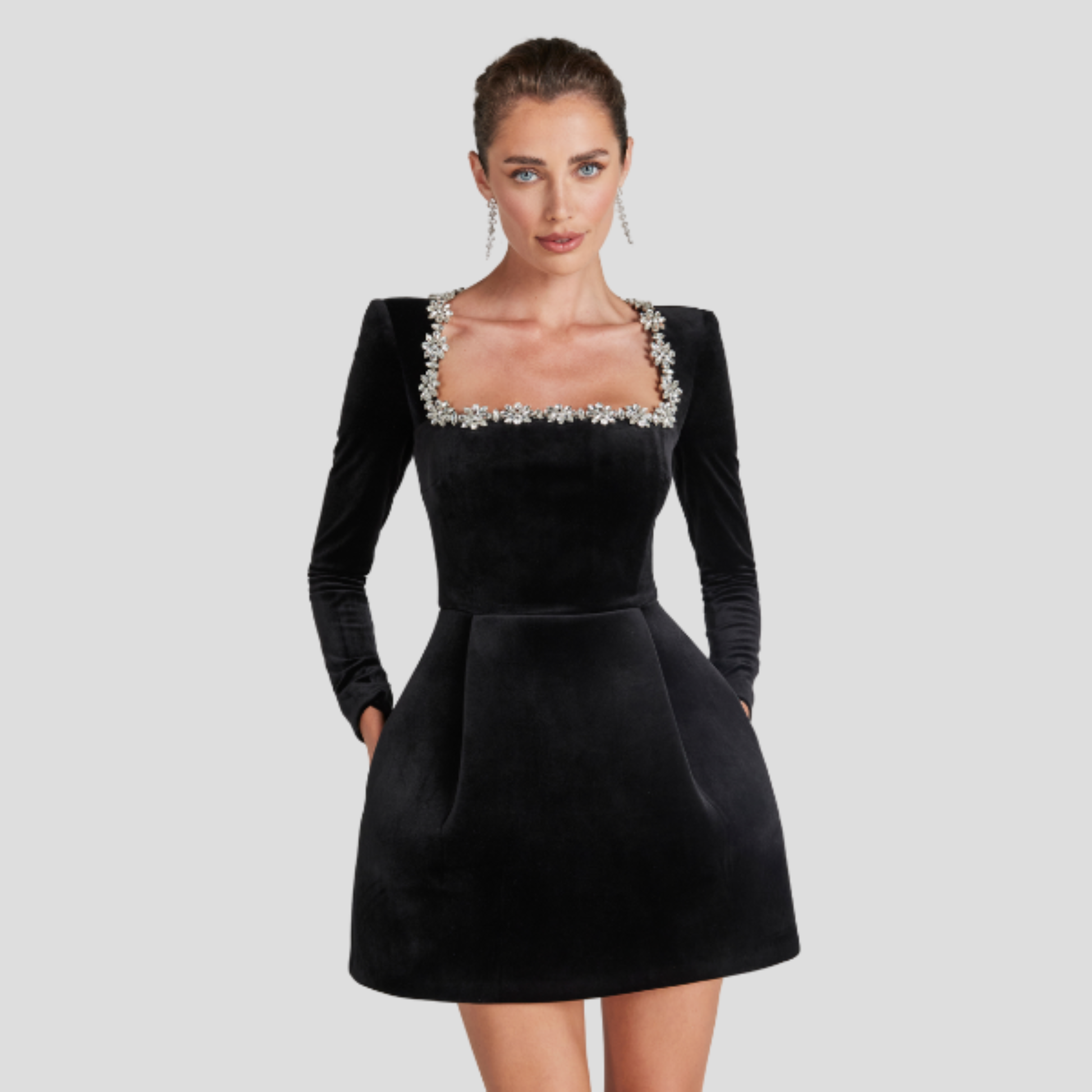 Women's structured cocktail dress with square neckline and embellished detailing in black