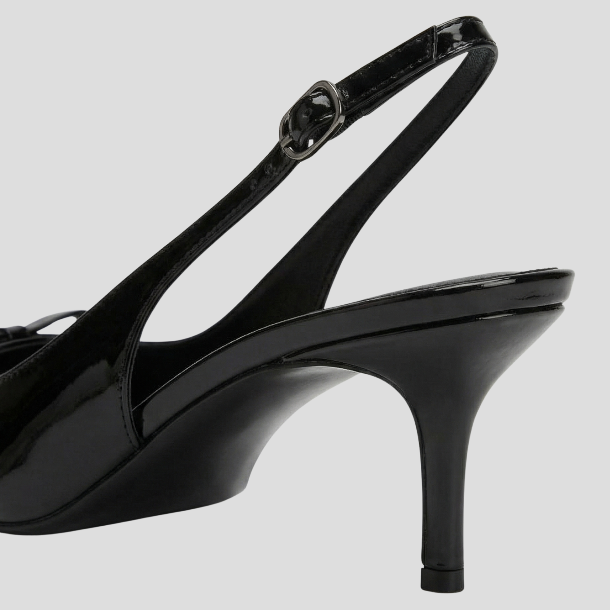 Black pointed toe slingback heel for evening wear