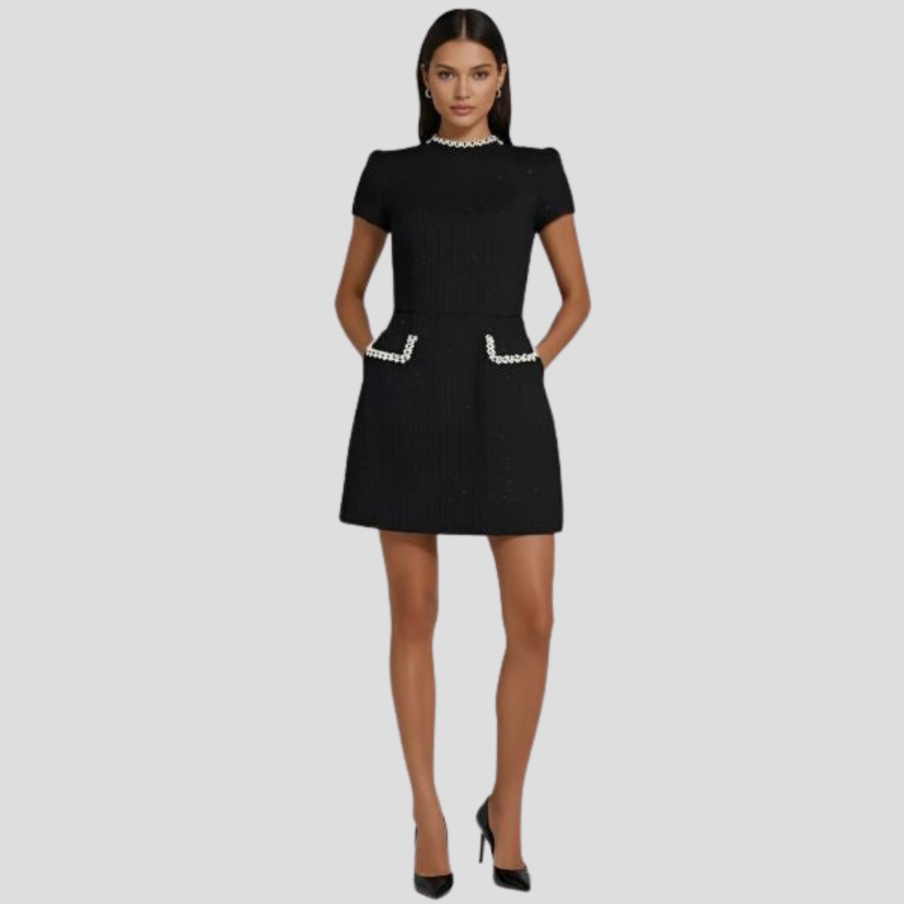 Structured mock neck mini dress with pearl-trim detailing in black and white