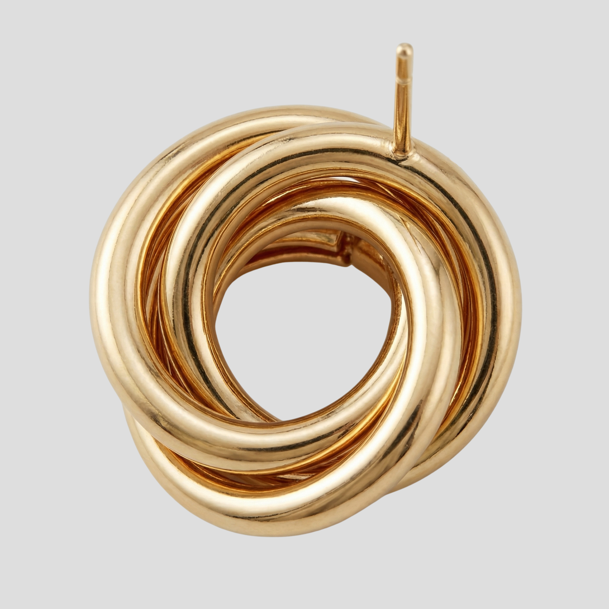 Gold-tone interwoven knot stud earrings with a polished outline for everyday wear