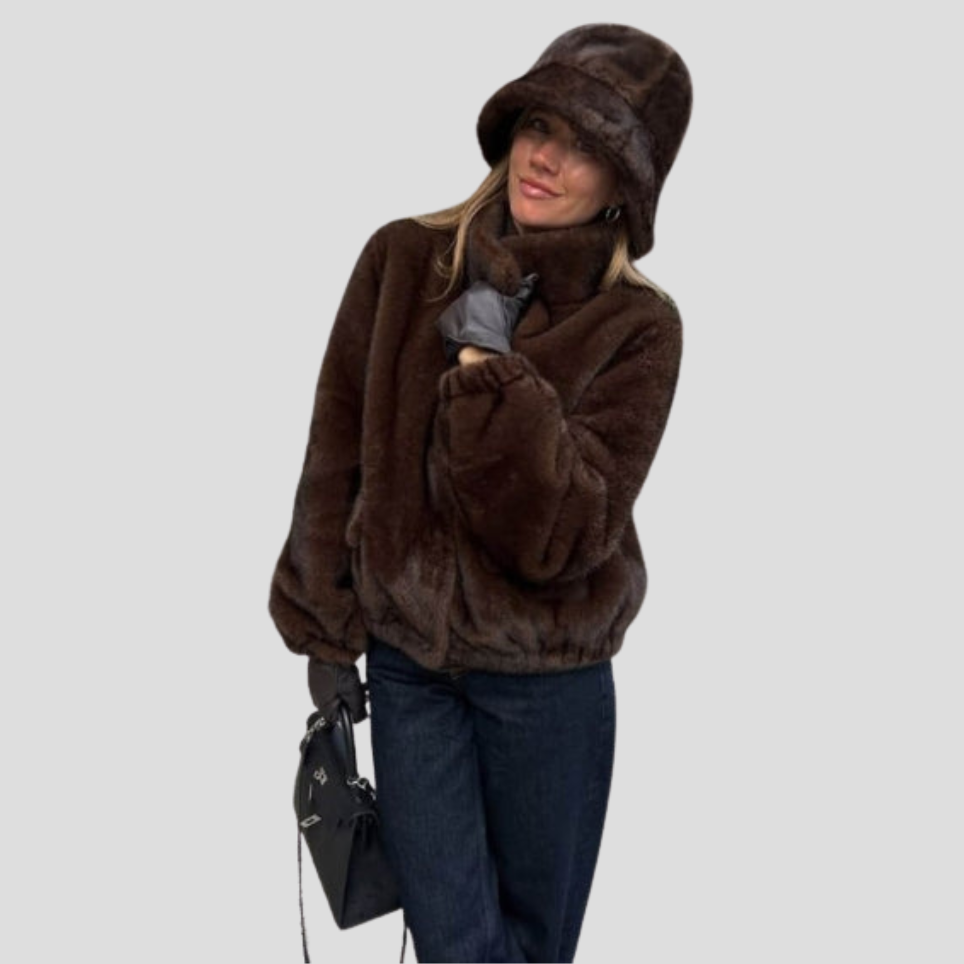 Women's bucket hat with rounded crown and contoured brim, shown in neutral colorways