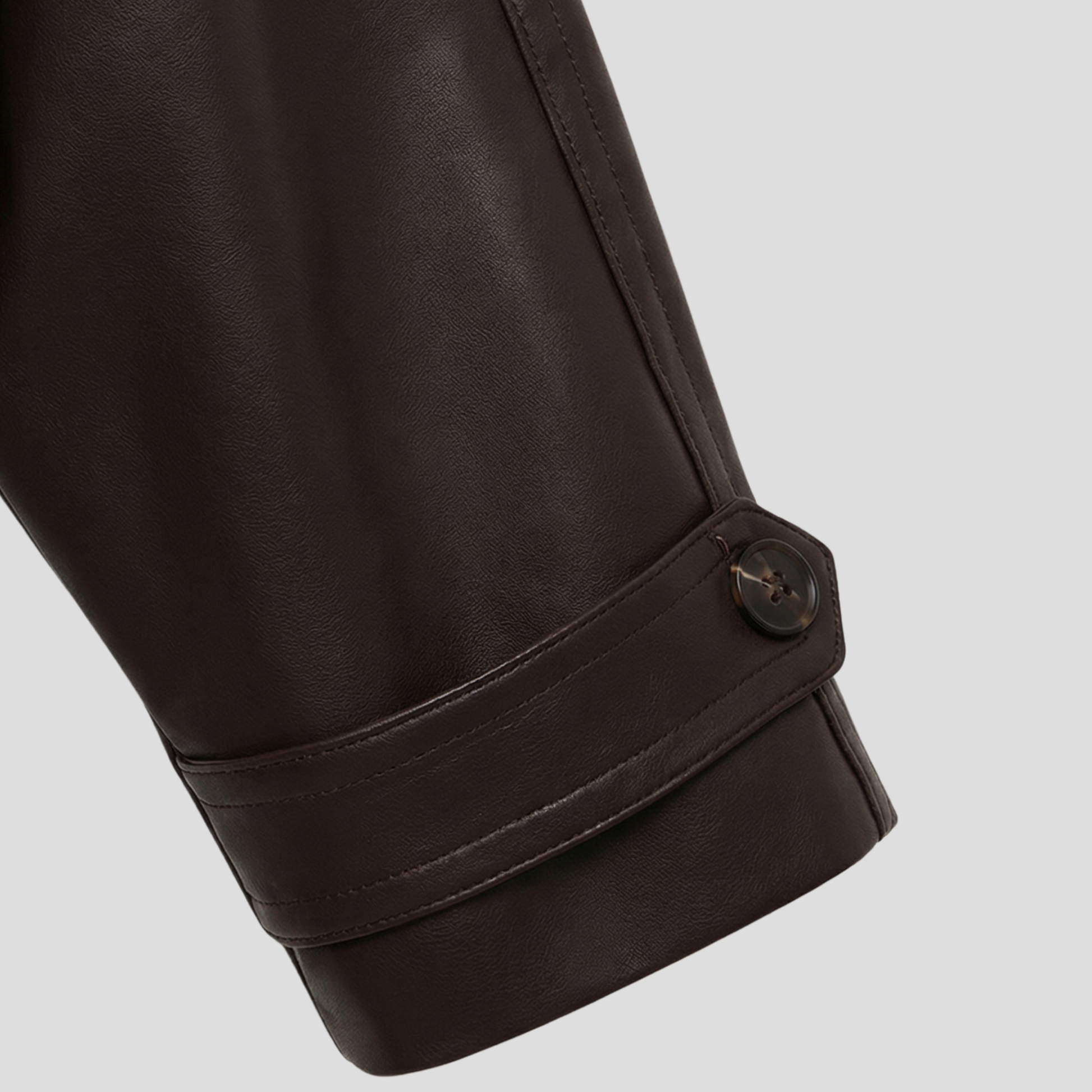 Brown cropped double-breasted women's jacket with defined collar and clean lines