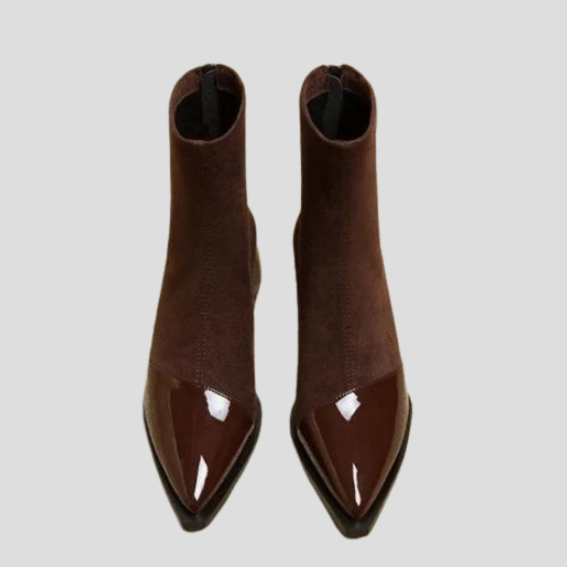 Women's ankle-height boots with contrast detail, shown in black and brown