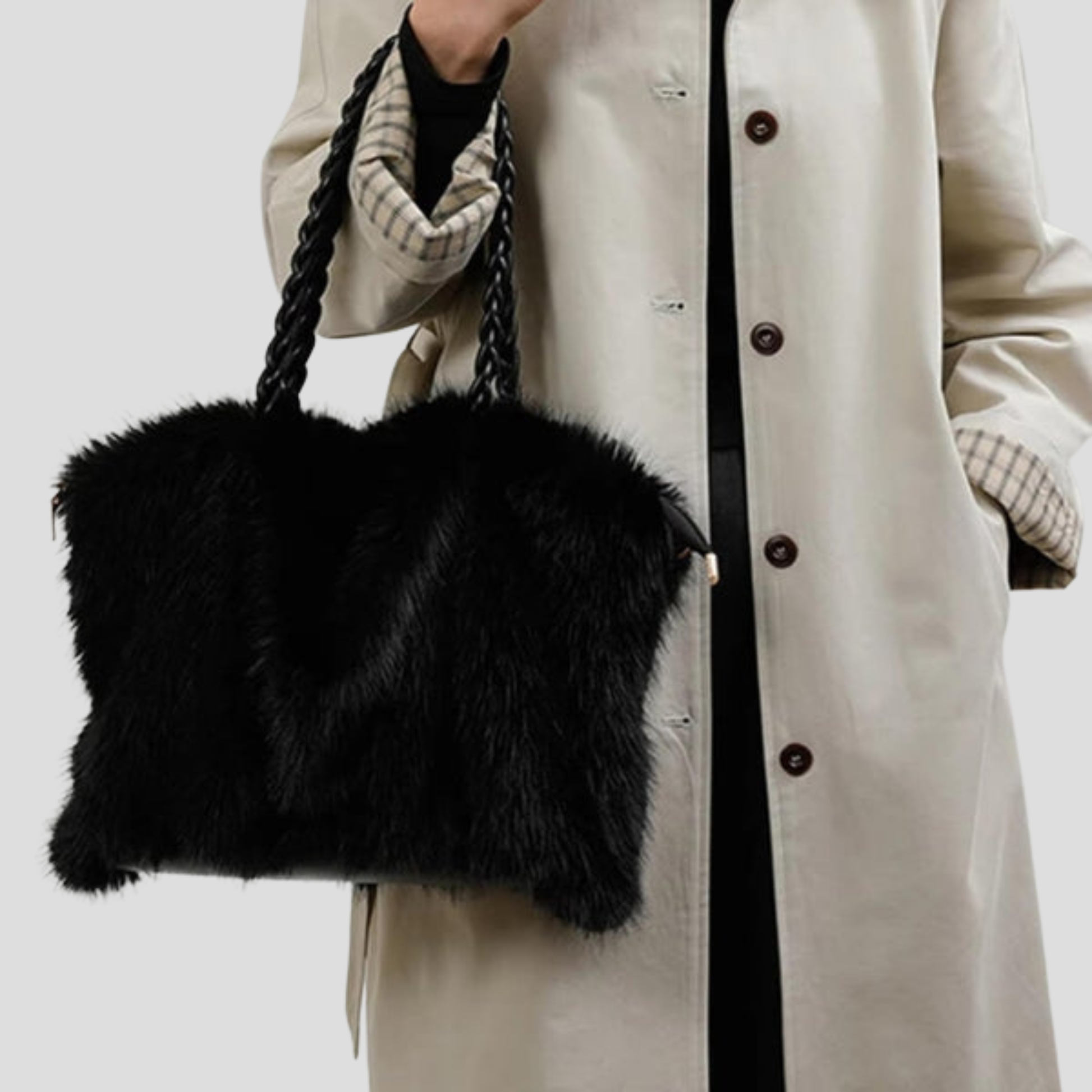 Oversized tote bag with braided handle detail, shown in black, brown, and beige