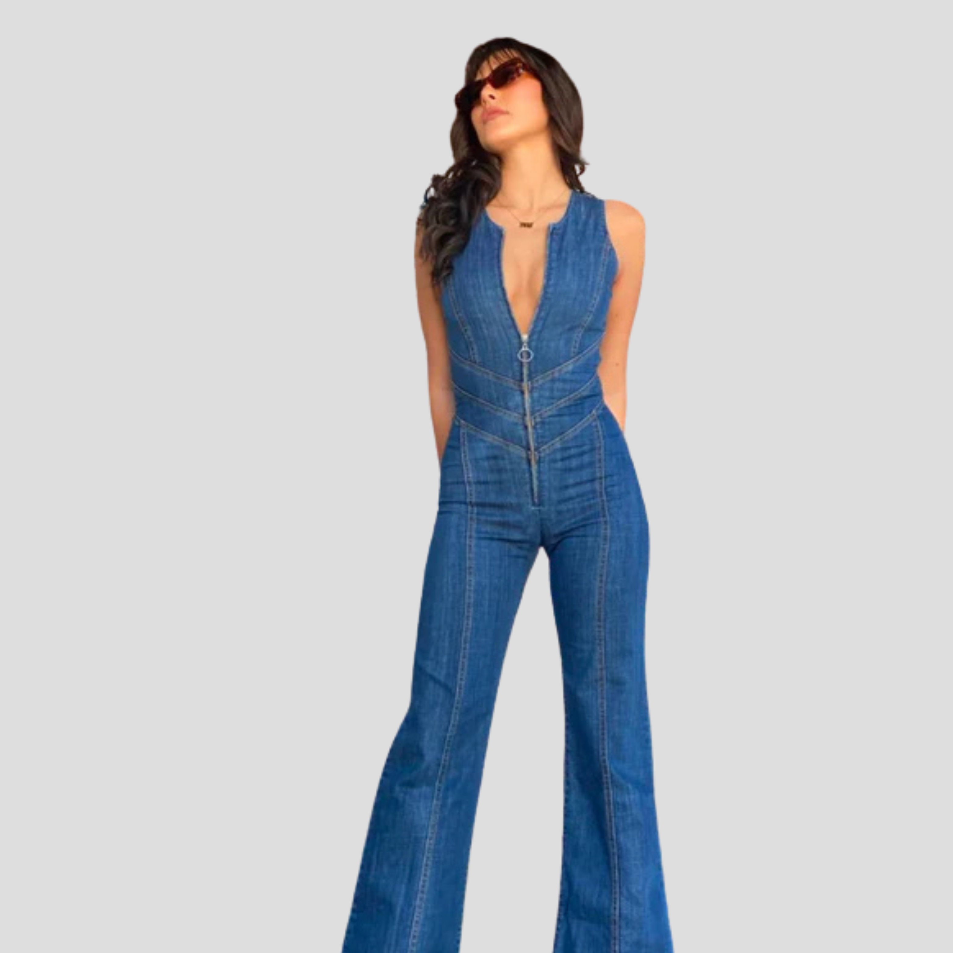 Blue women's jumpsuit with plunge neckline and open cutout back silhouette