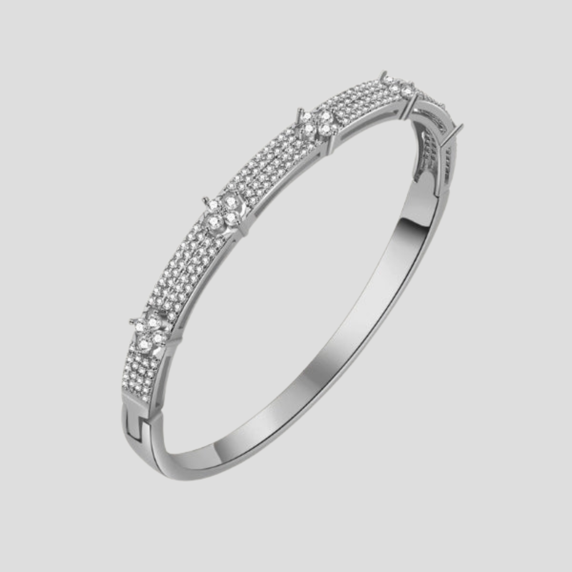 Hinged women's cuff bracelet with pavé panel detail in gold and silver tones