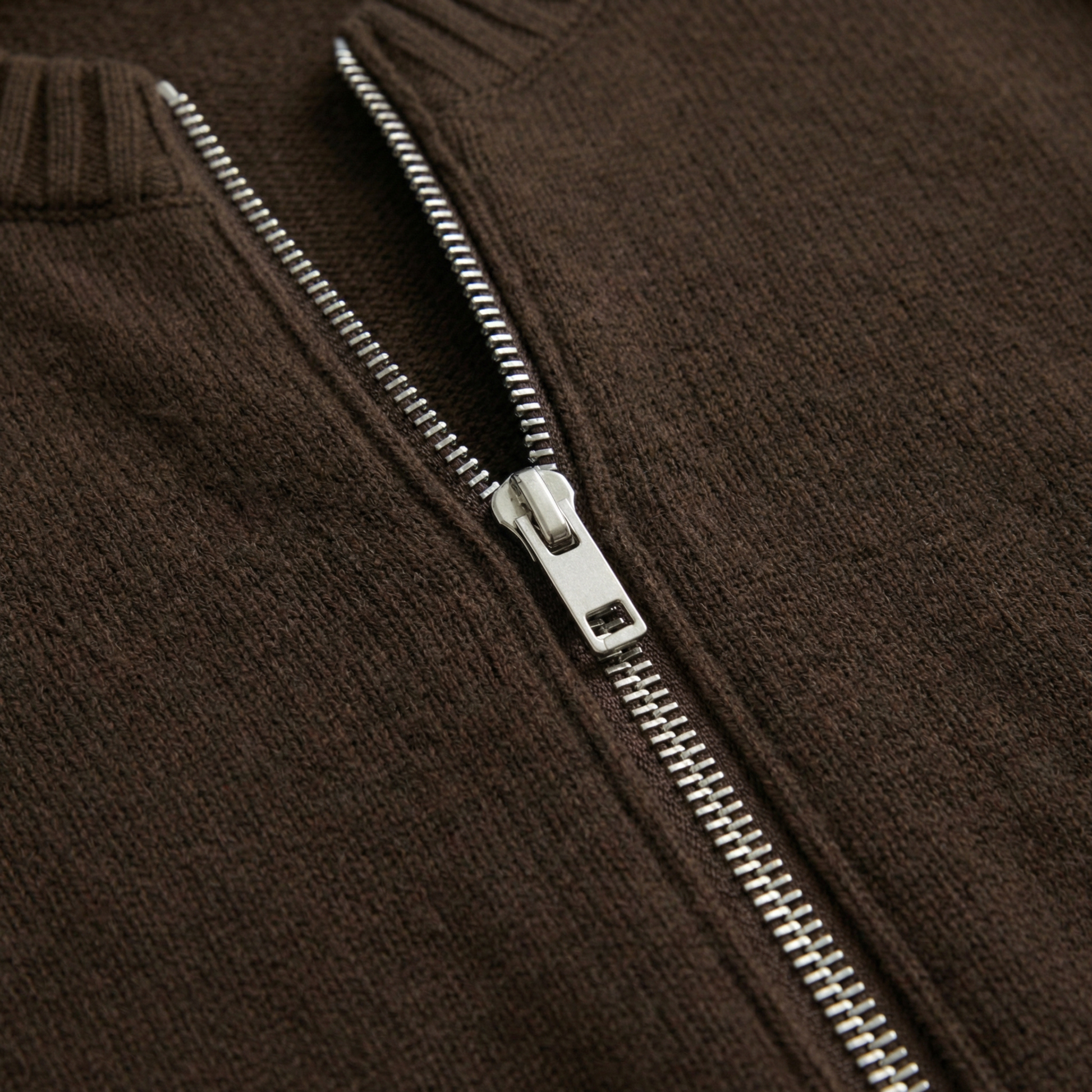 Women's zip-front relaxed cardigan shown in brown, beige and grey